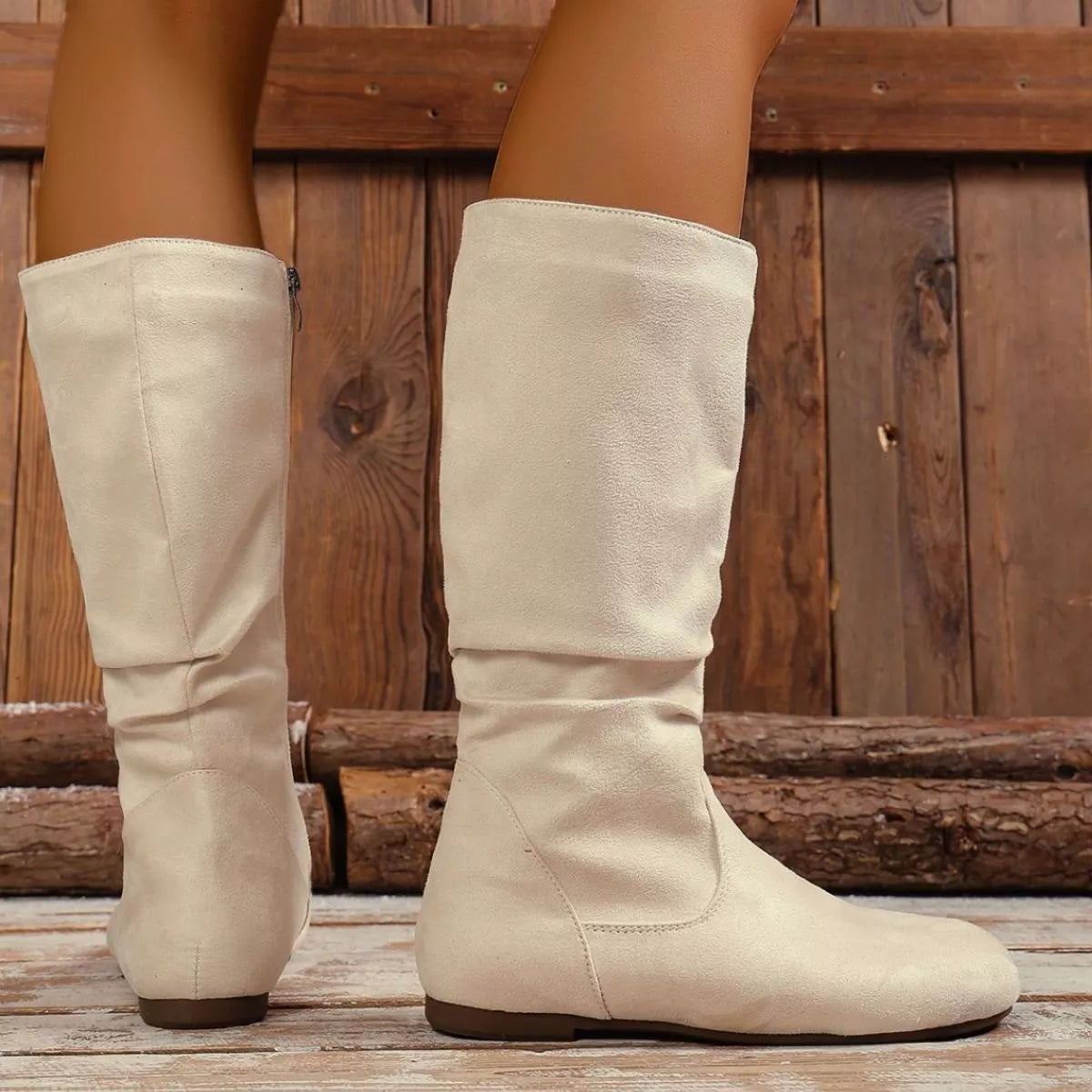 Round toe side zip boots three quarter angle