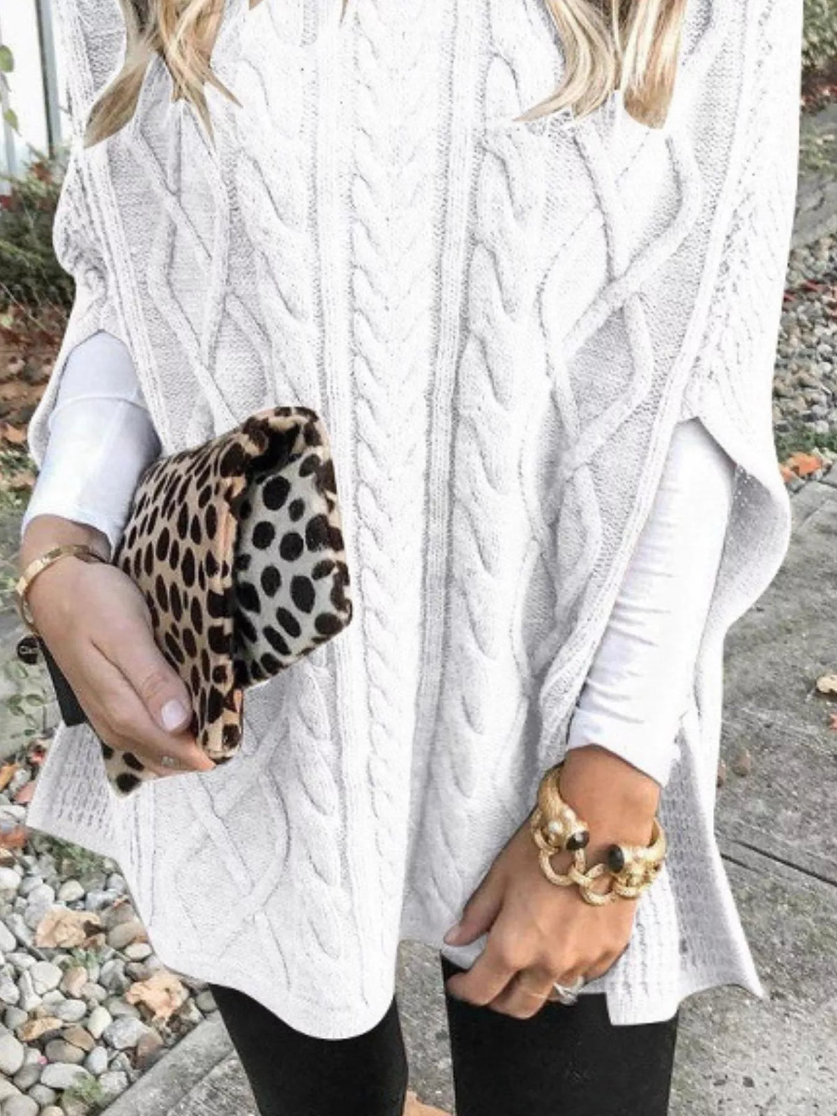 Chunky cable knit turtleneck poncho styled outfit view
