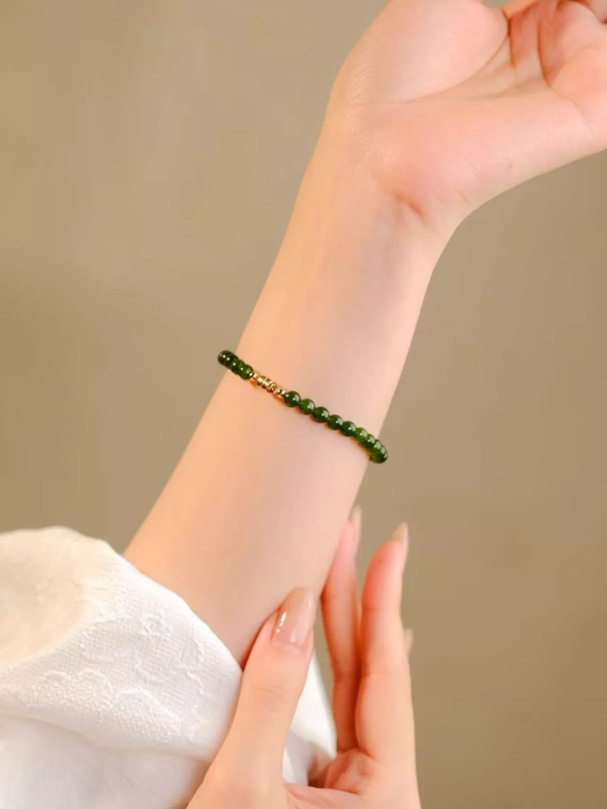 Dark green agate beaded bracelet on model