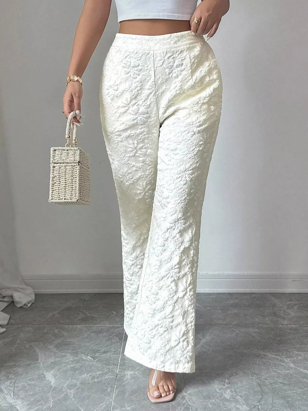 Close up of the floral texture on the white fabric