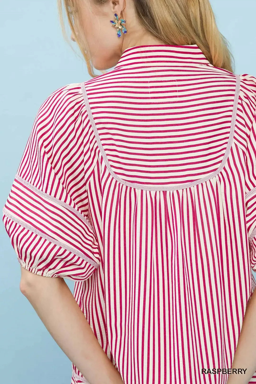 Raspberry striped babydoll top side view