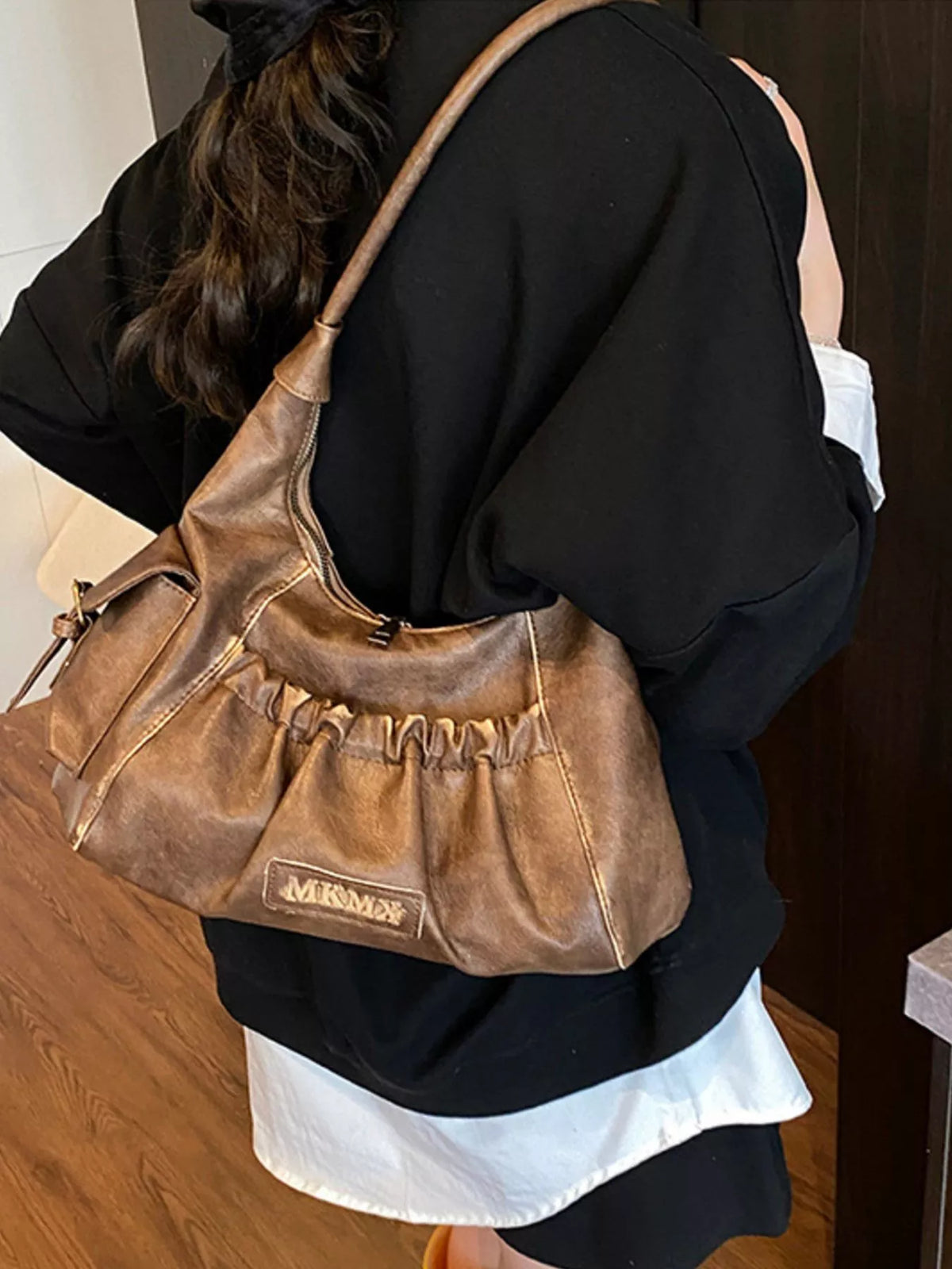 Ruched hobo bag strap detail