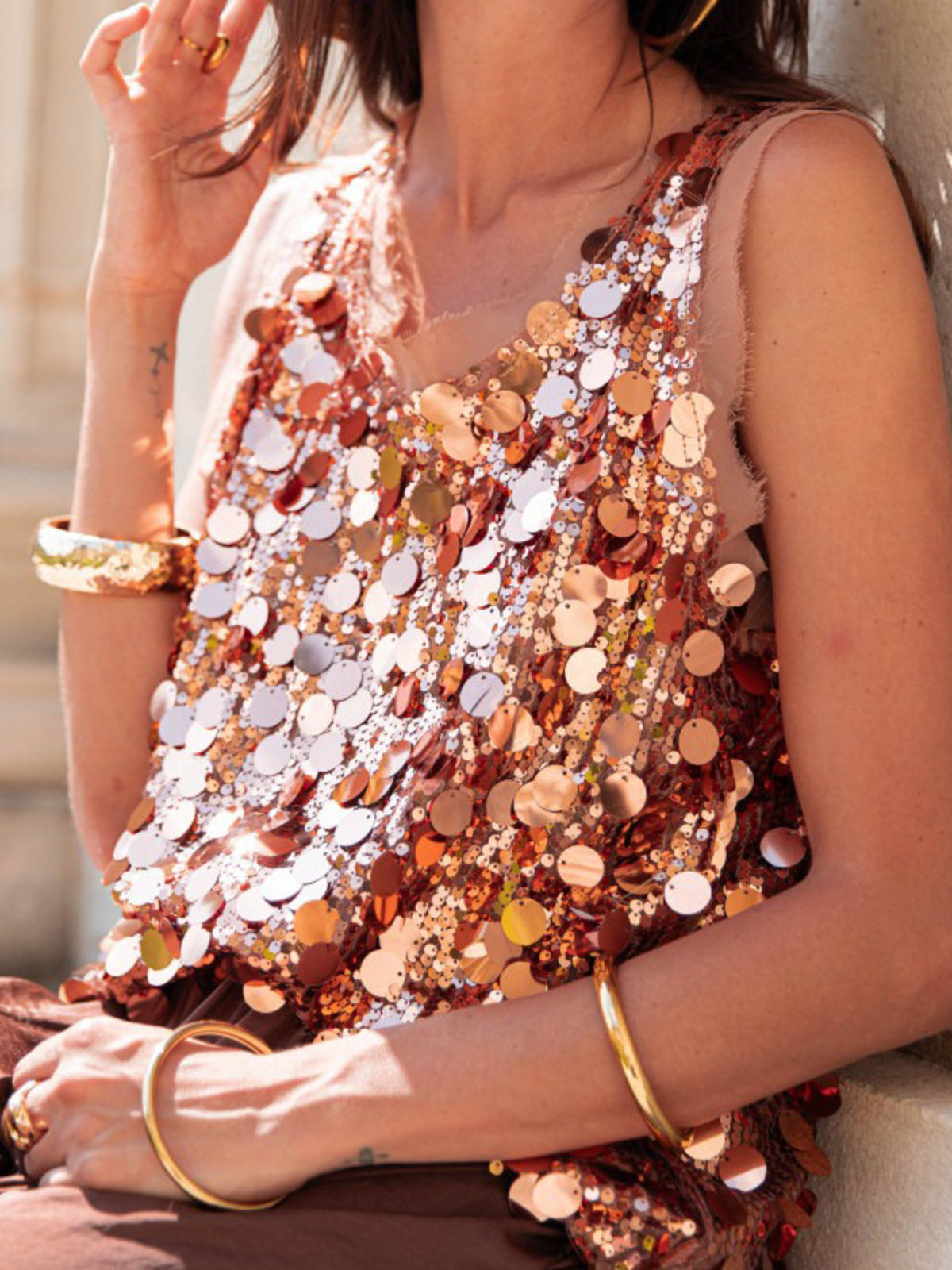 Three quarter back view of the sequin tank