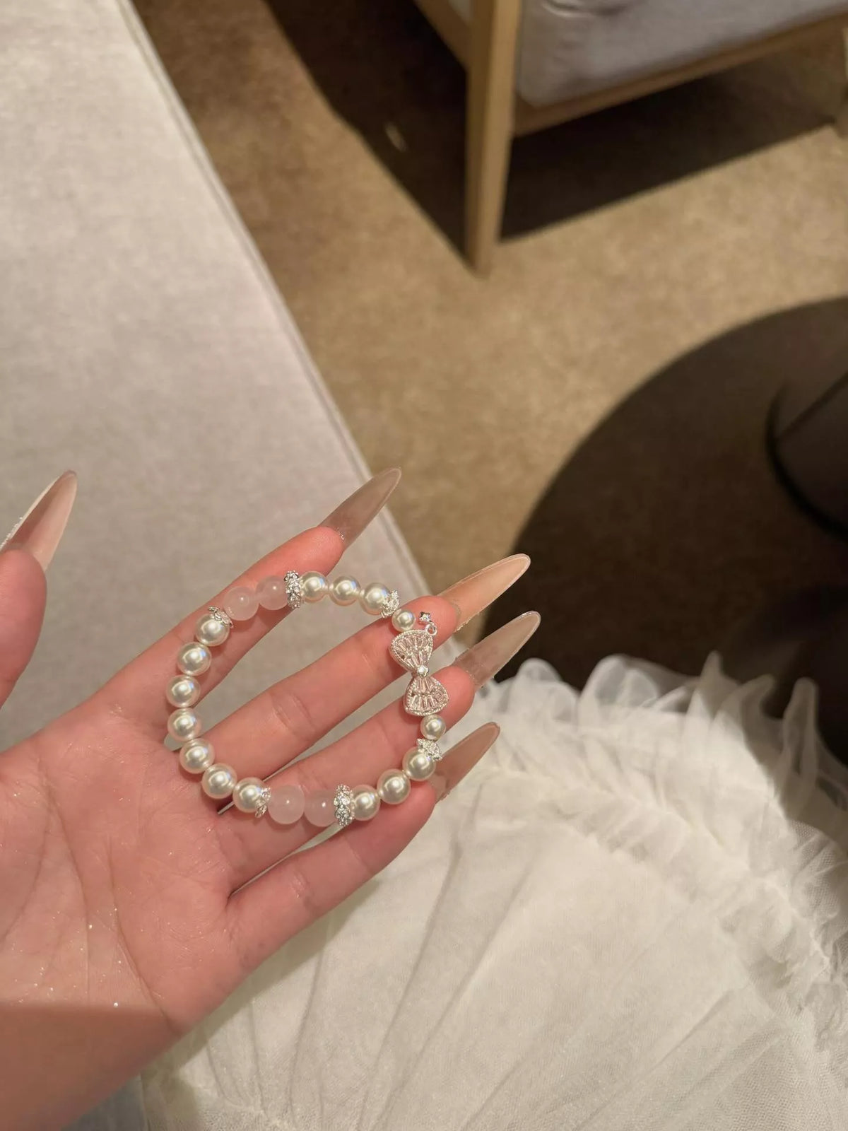 Pearl bracelet bow close up