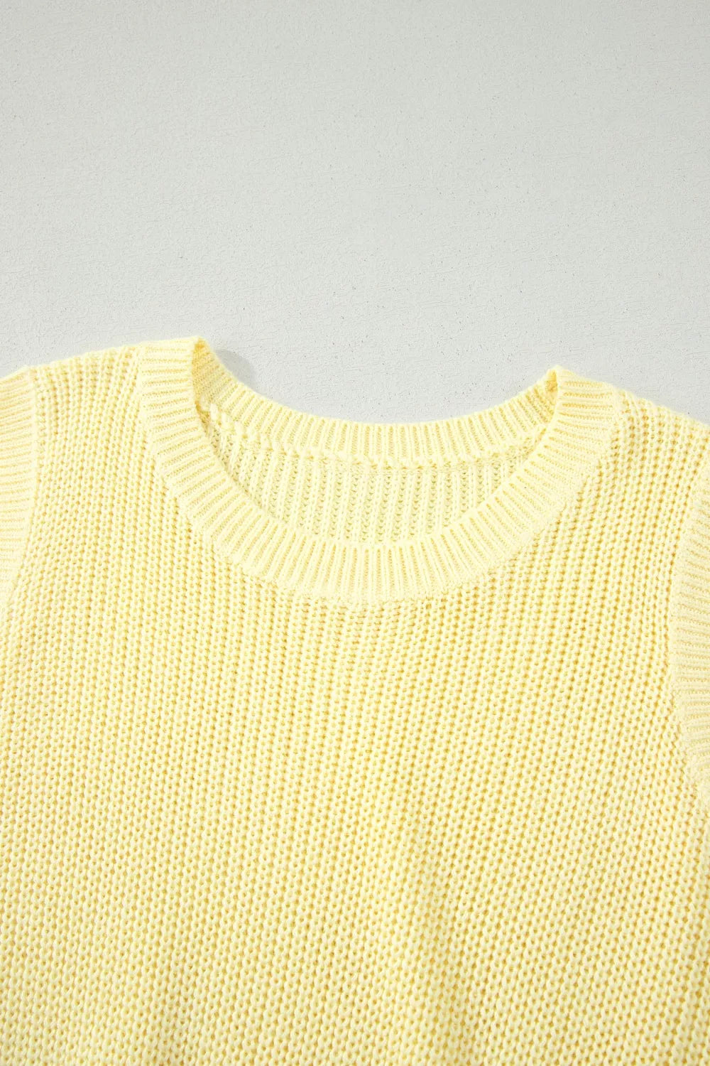 Cropped knit tank top neckline detail