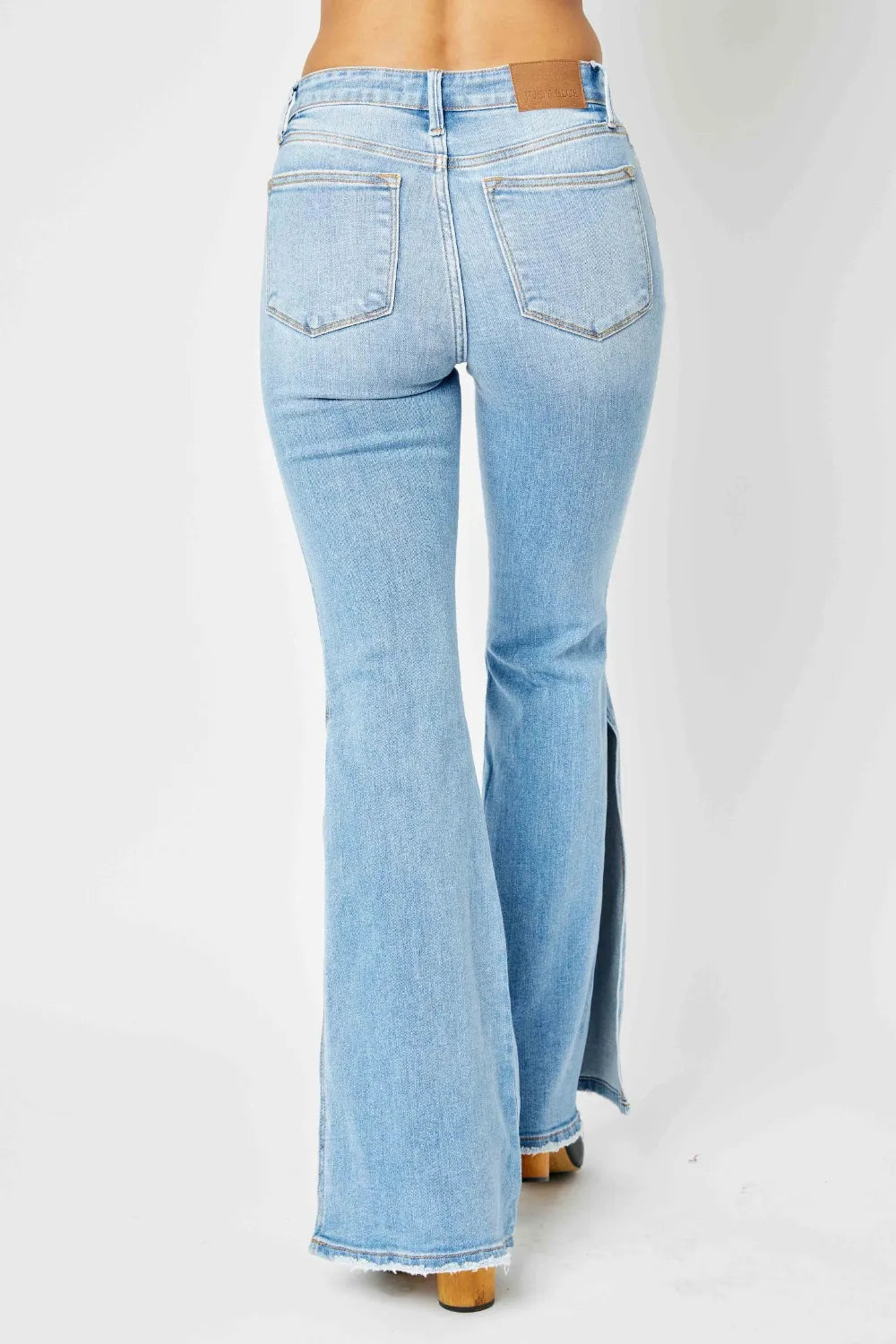 Judy Blue Full Size Mid Rise Raw Hem Slit Flare Jeans - Fashorio