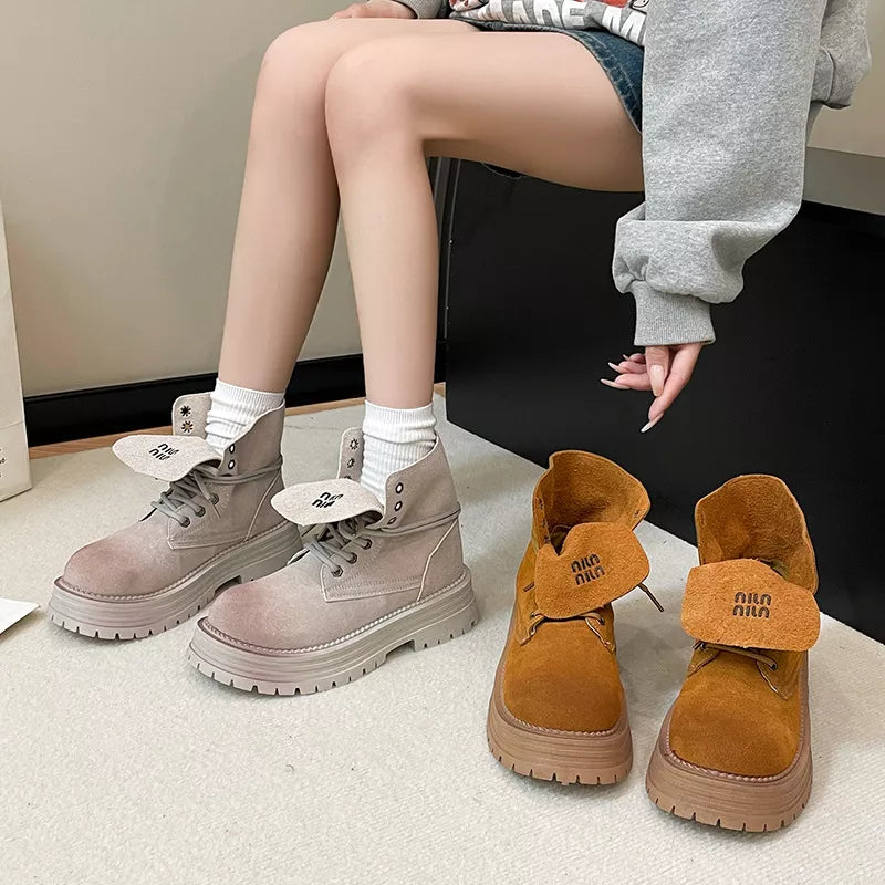 Lace up platform boots front view