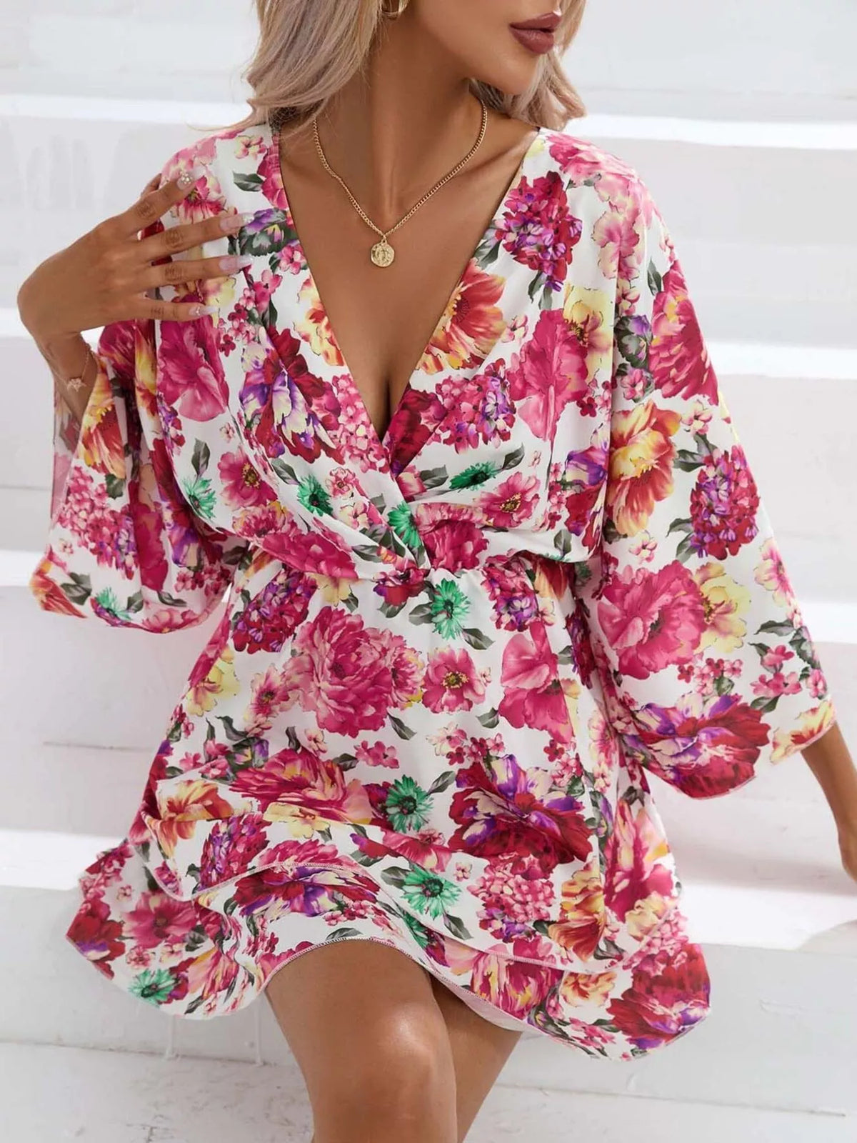 Floral print tiered ruffle hem mini dress front view