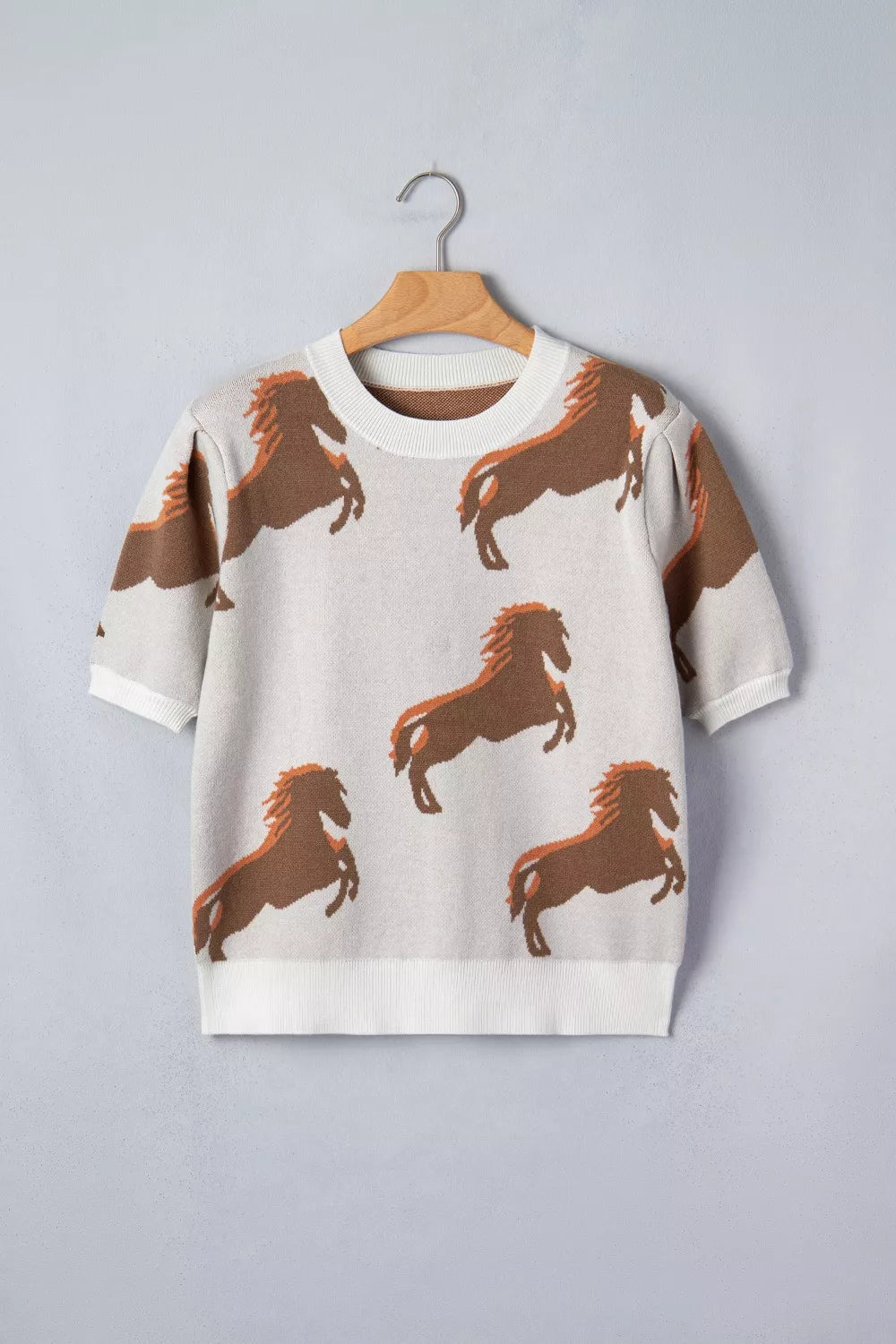 Ribbed beige horse sweater back view