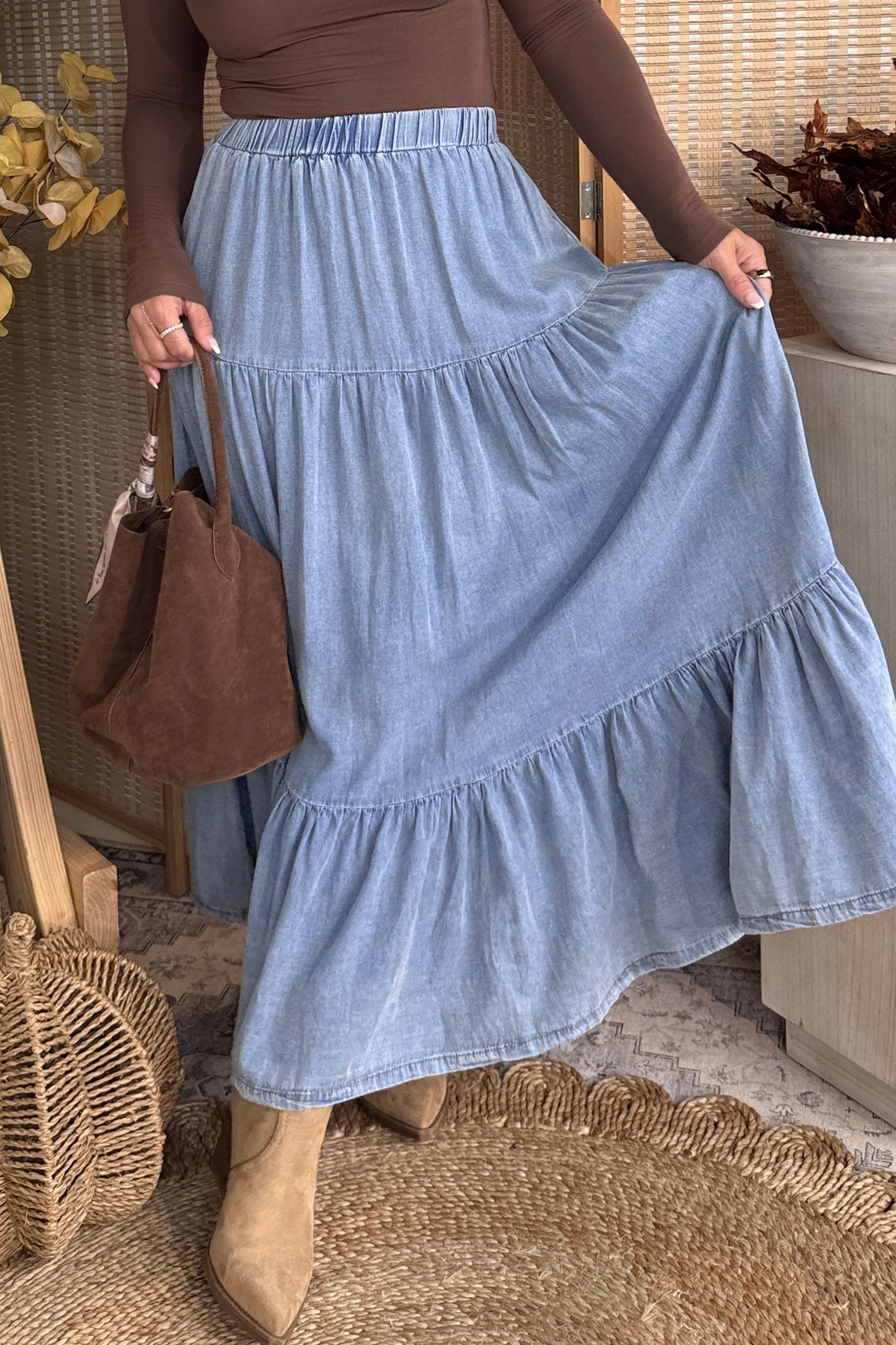 Black colorway of tiered denim maxi skirt