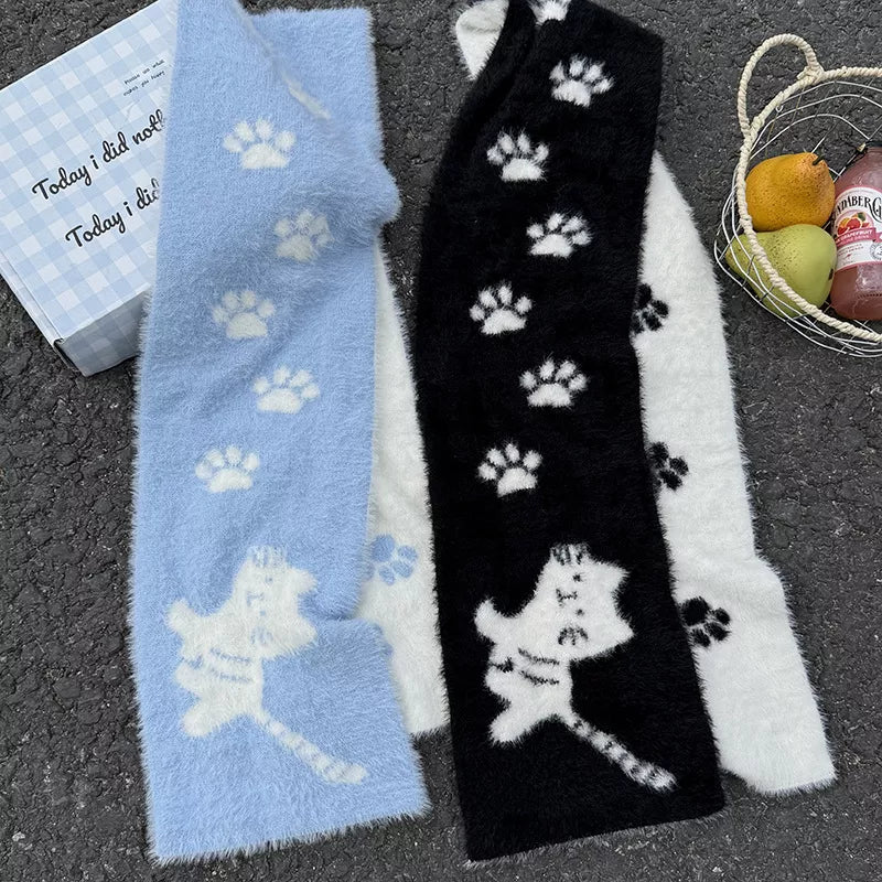 Plush cat paw scarf styled with a casual winter jacket