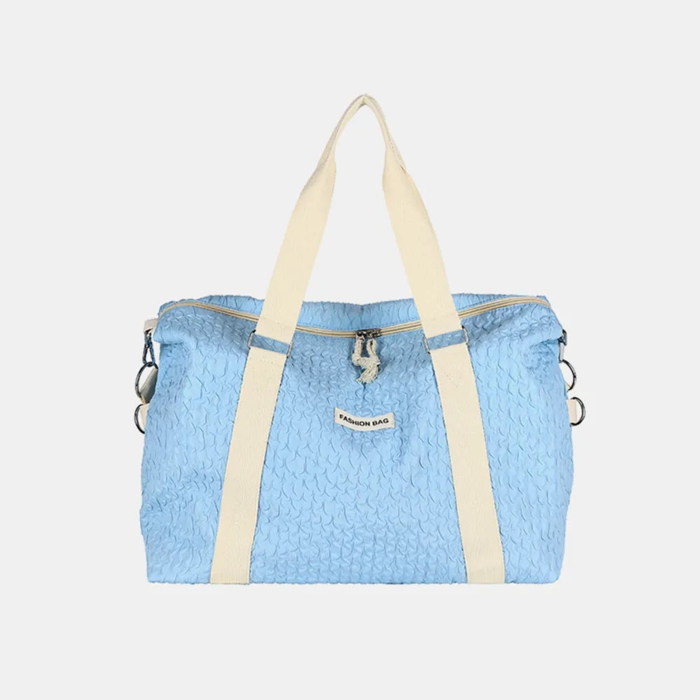 Fashorio Bags Pastel  Blue / One Size Textured Nylon Travel Bag