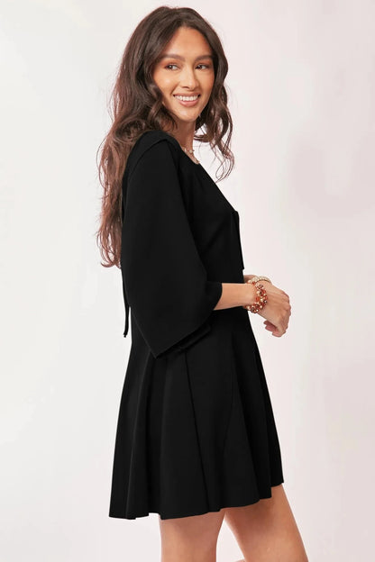 Davi & Dani Solid Draped Sleeve Ties Back Skort Romper - Fashorio