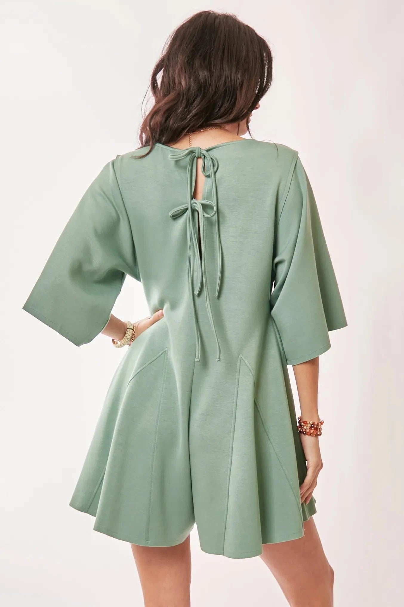 Davi & Dani Solid Draped Sleeve Ties Back Skort Romper - Fashorio