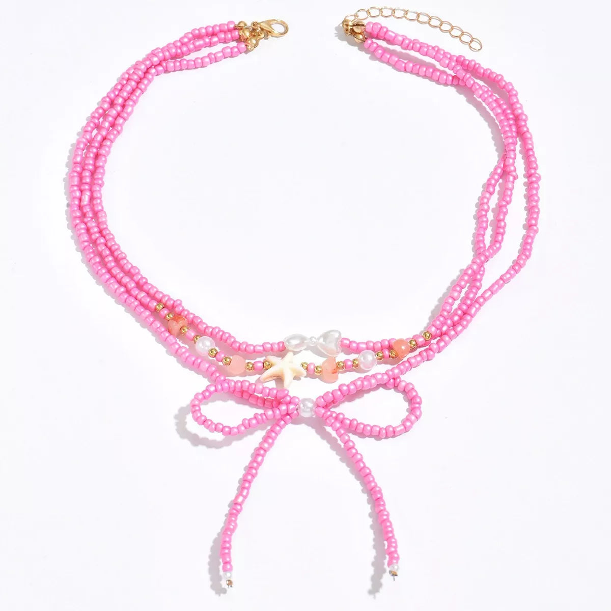 Fashorio Fuchsia Pink / onesize Beaded Three-Layered Necklace with Bow and Starfish Charms