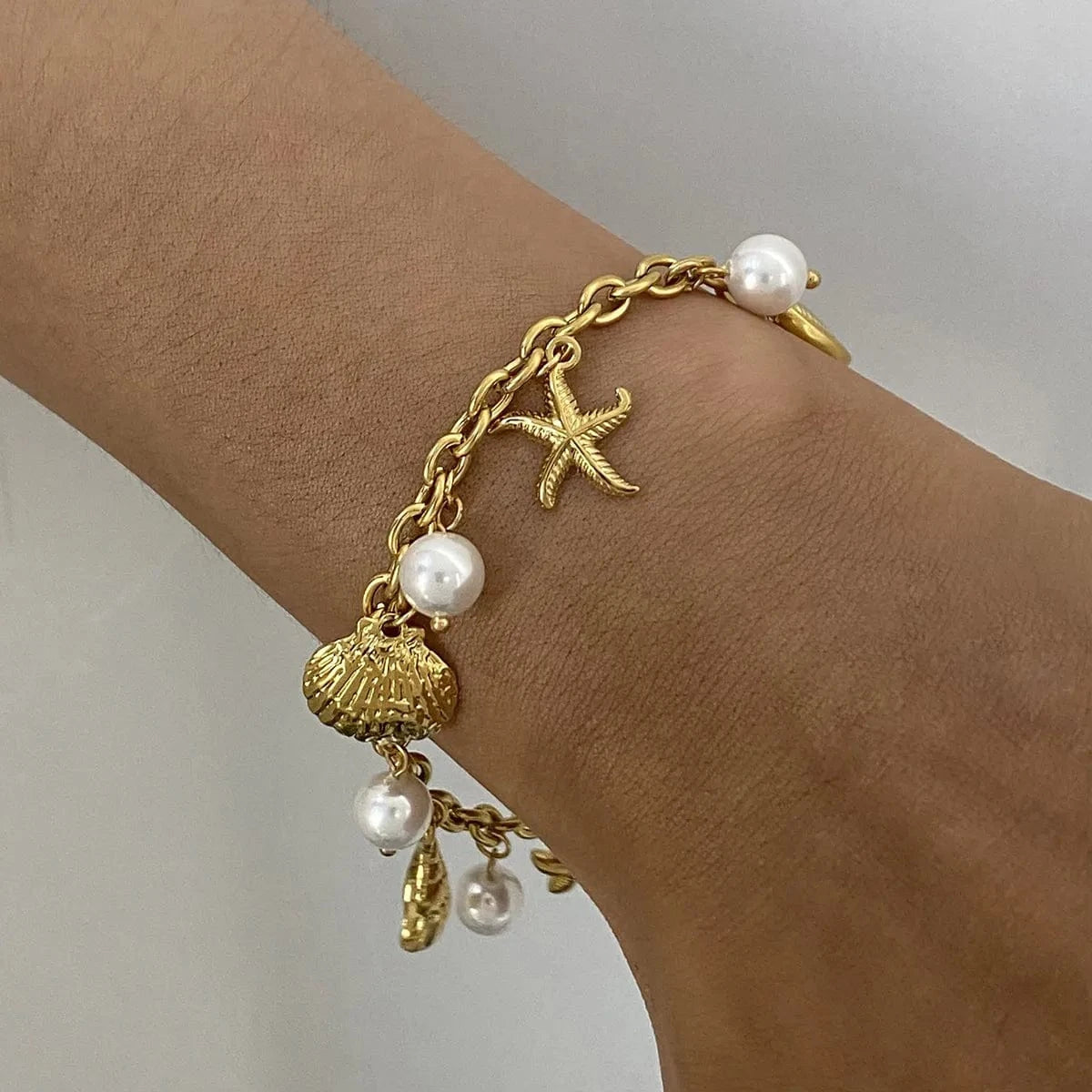 Fashorio Gold / One Size Ocean Theme Stainless Steel Chain Bracelet with Seashell and Starfish Pendants