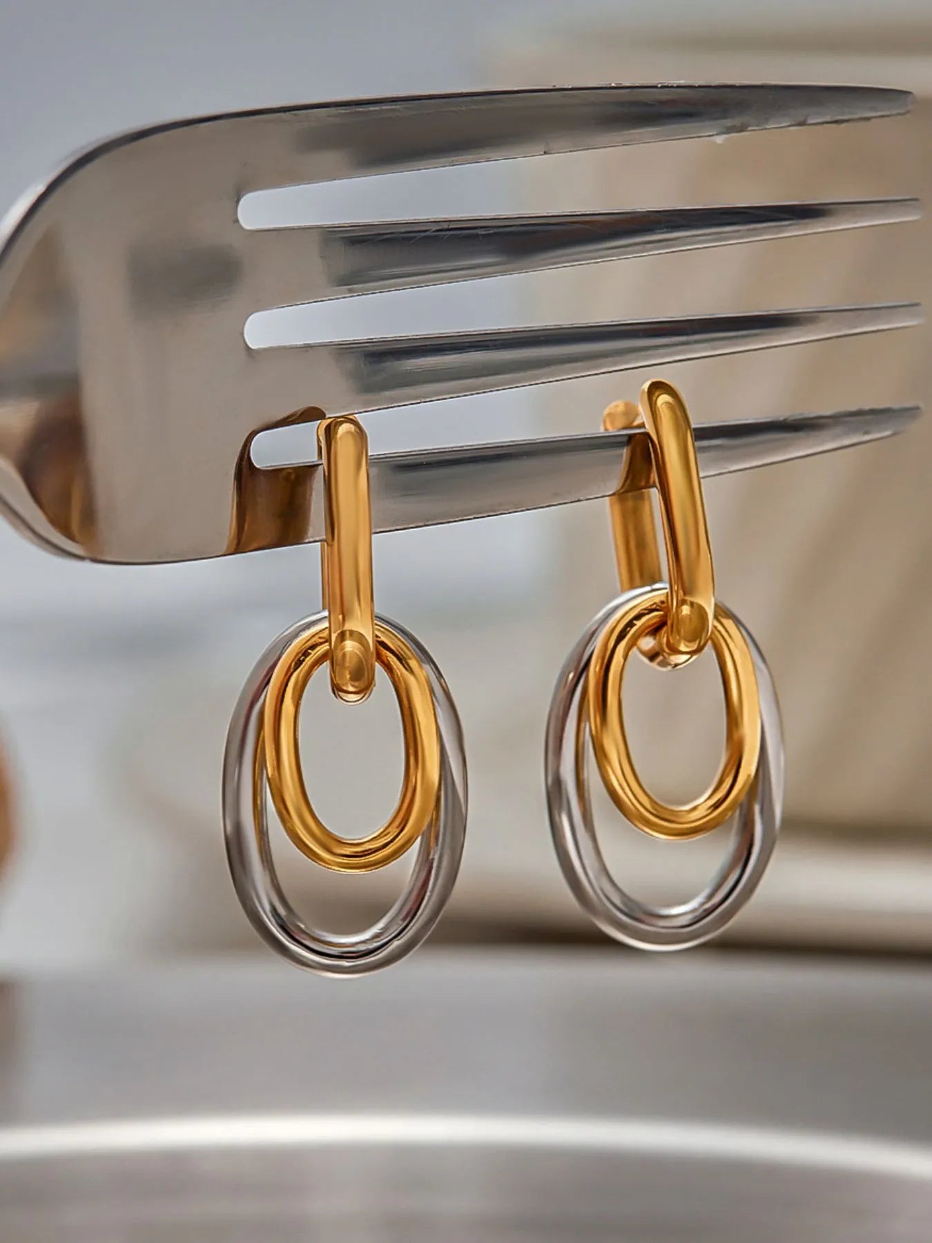 Fashorio Gold / One Size Stainless Steel Two-Tone Interlocked Hoop Earrings