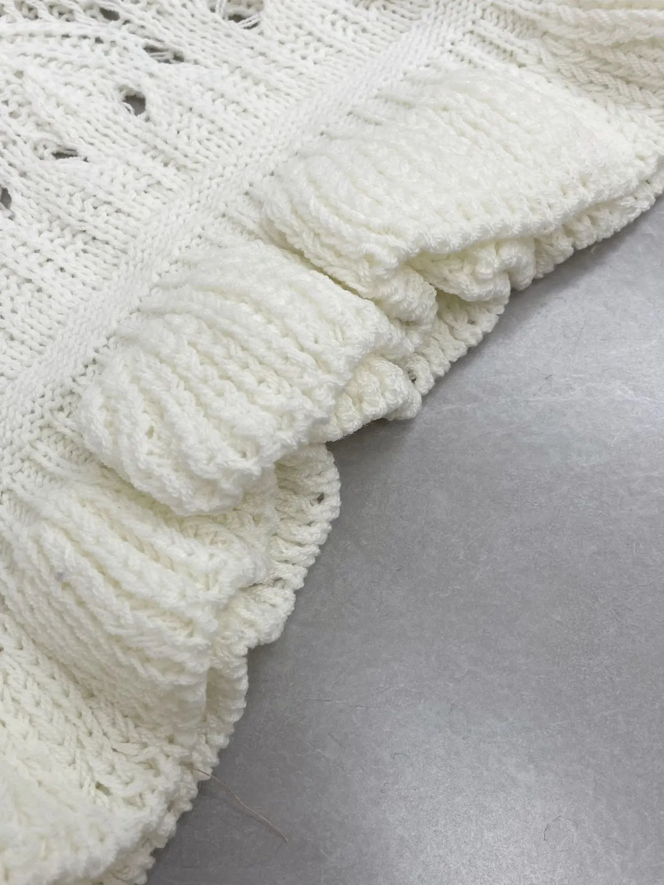 Fashorio Knit Tops Crochet Ruffled Hem Long Sleeve Sweater