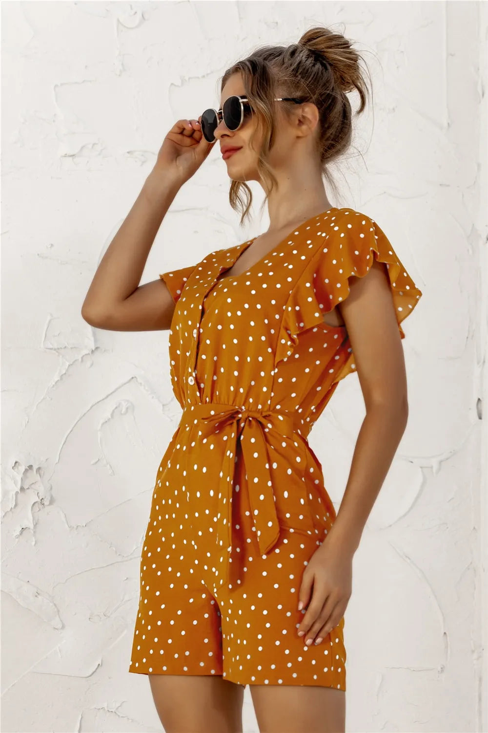 Fashorio Ruffled Polka Dot Half Button Romper