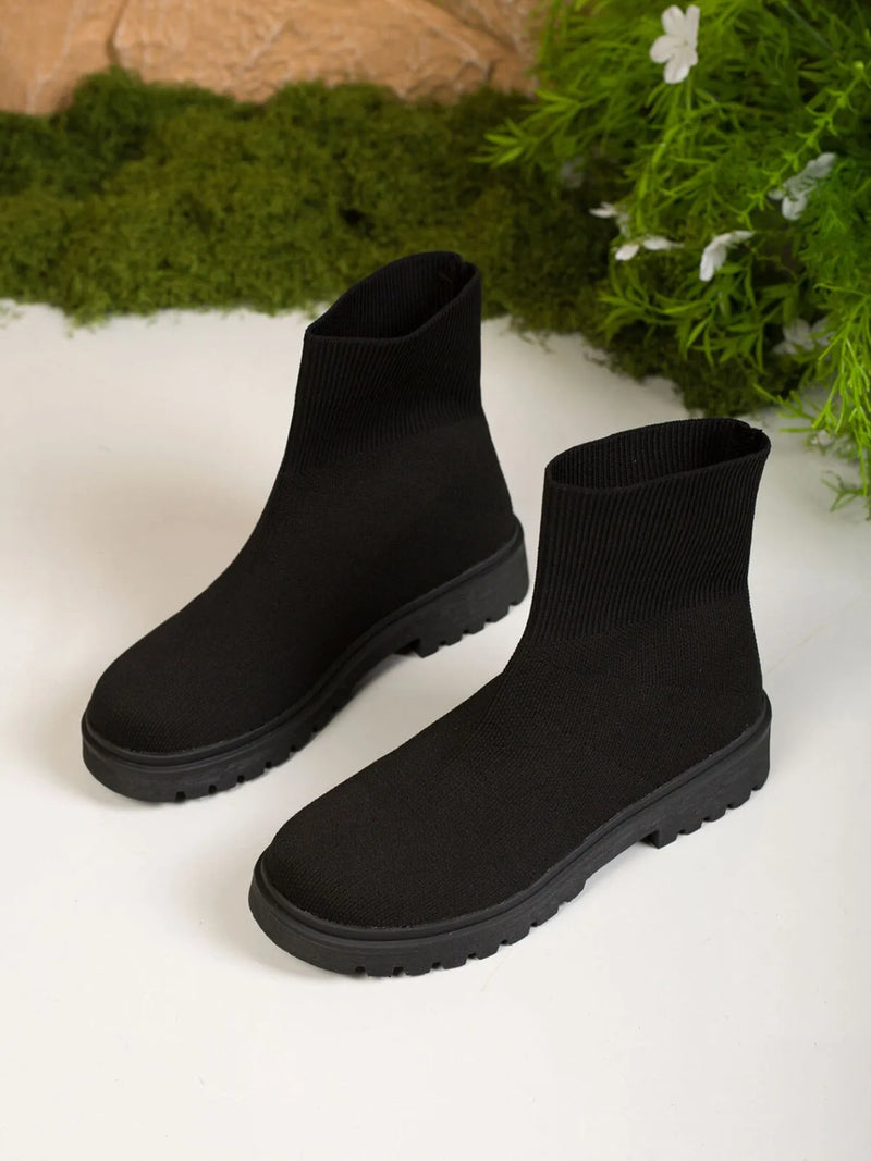 Knit ankle boots in Black, front view
