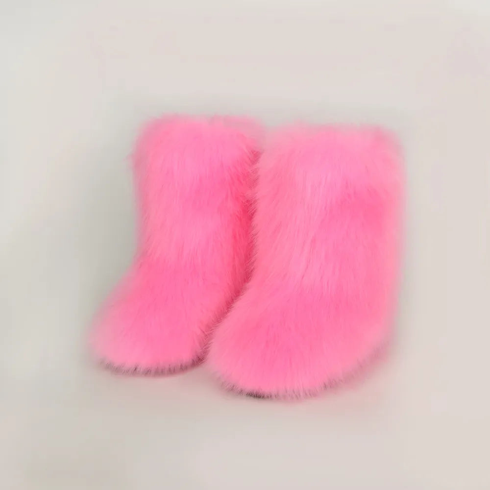 Fuchsia Pink thermal fuzzy platform boots pair standing together