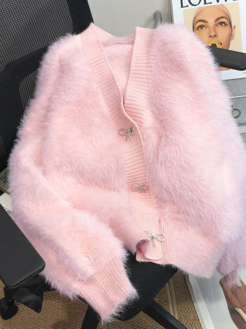 Fuzzy bow button up cardigan front view