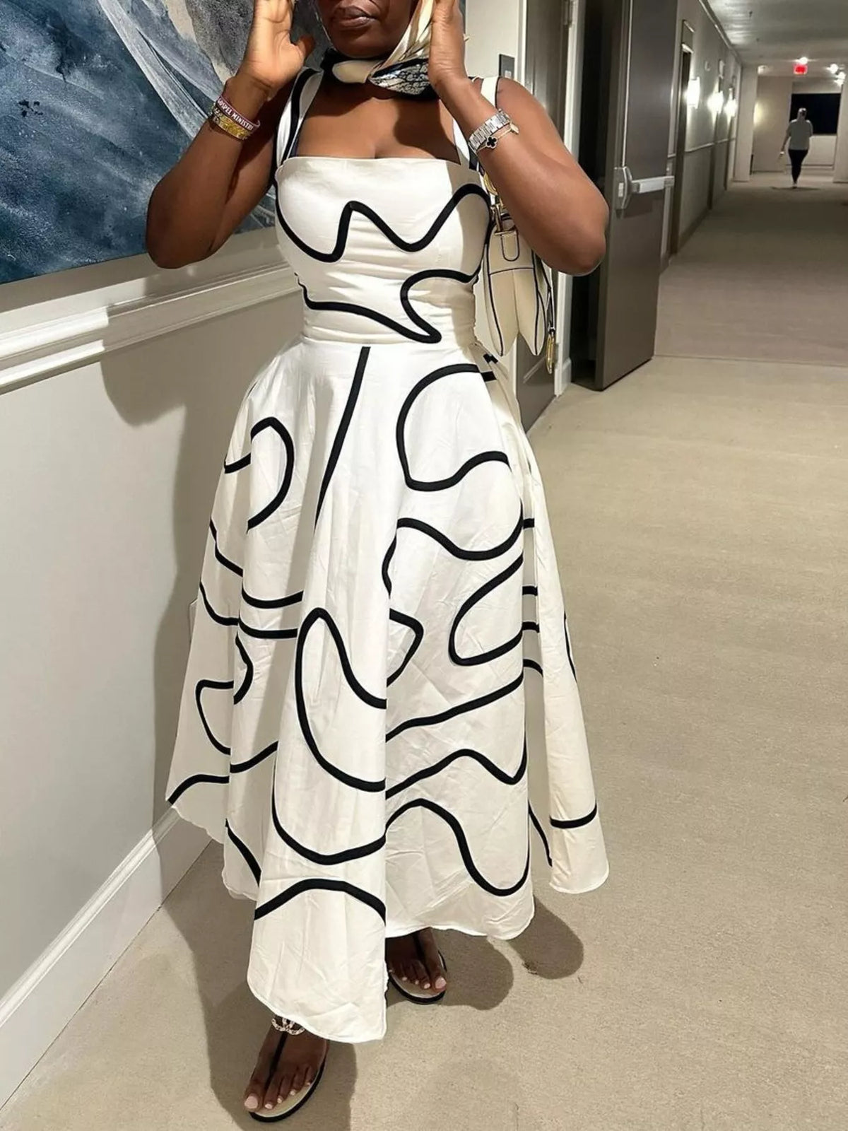 Abstract print square neck dress shown full length from the front