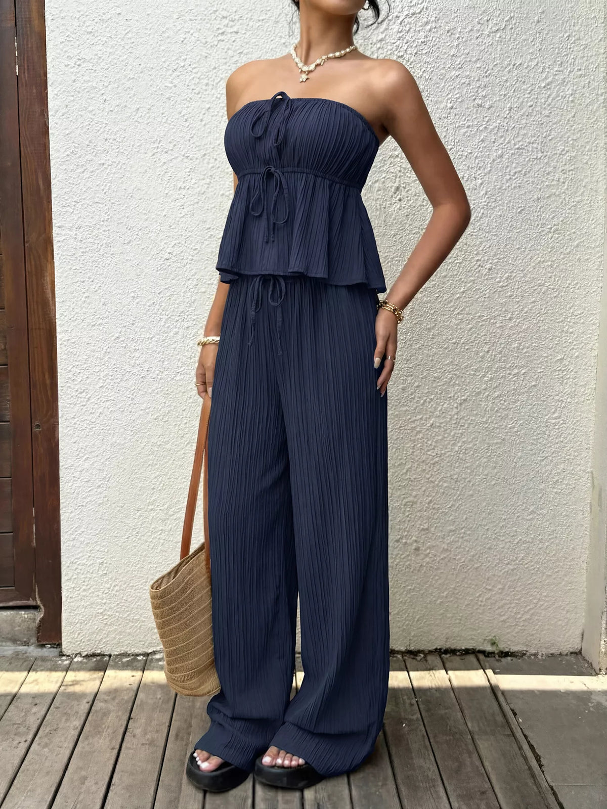 Coordinated tube top and wide leg pants outfit