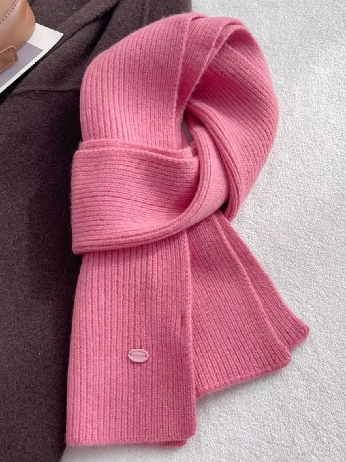 Gray pure wool scarf draped over the shoulders