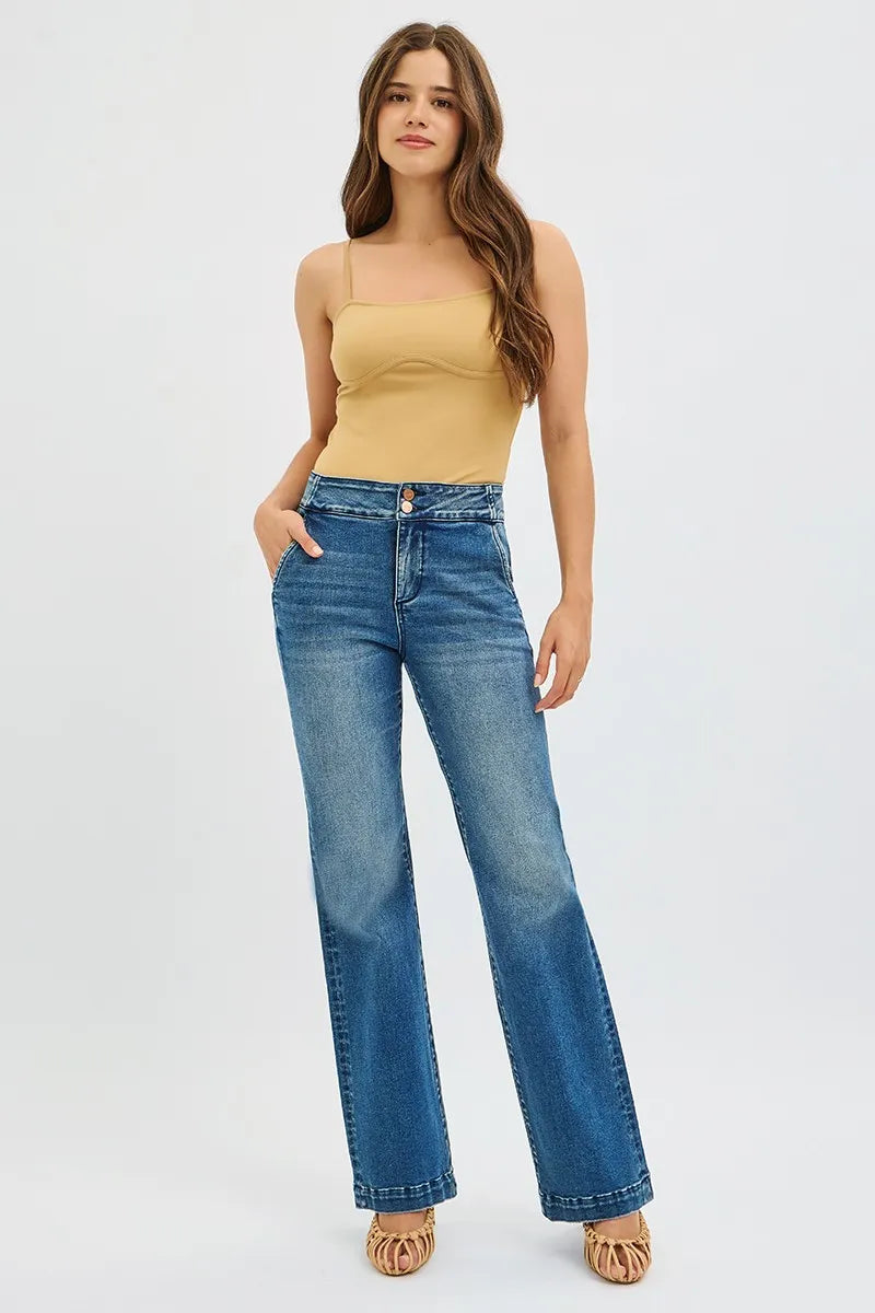 Model wearing RISEN double button bootcut jeans styled look
