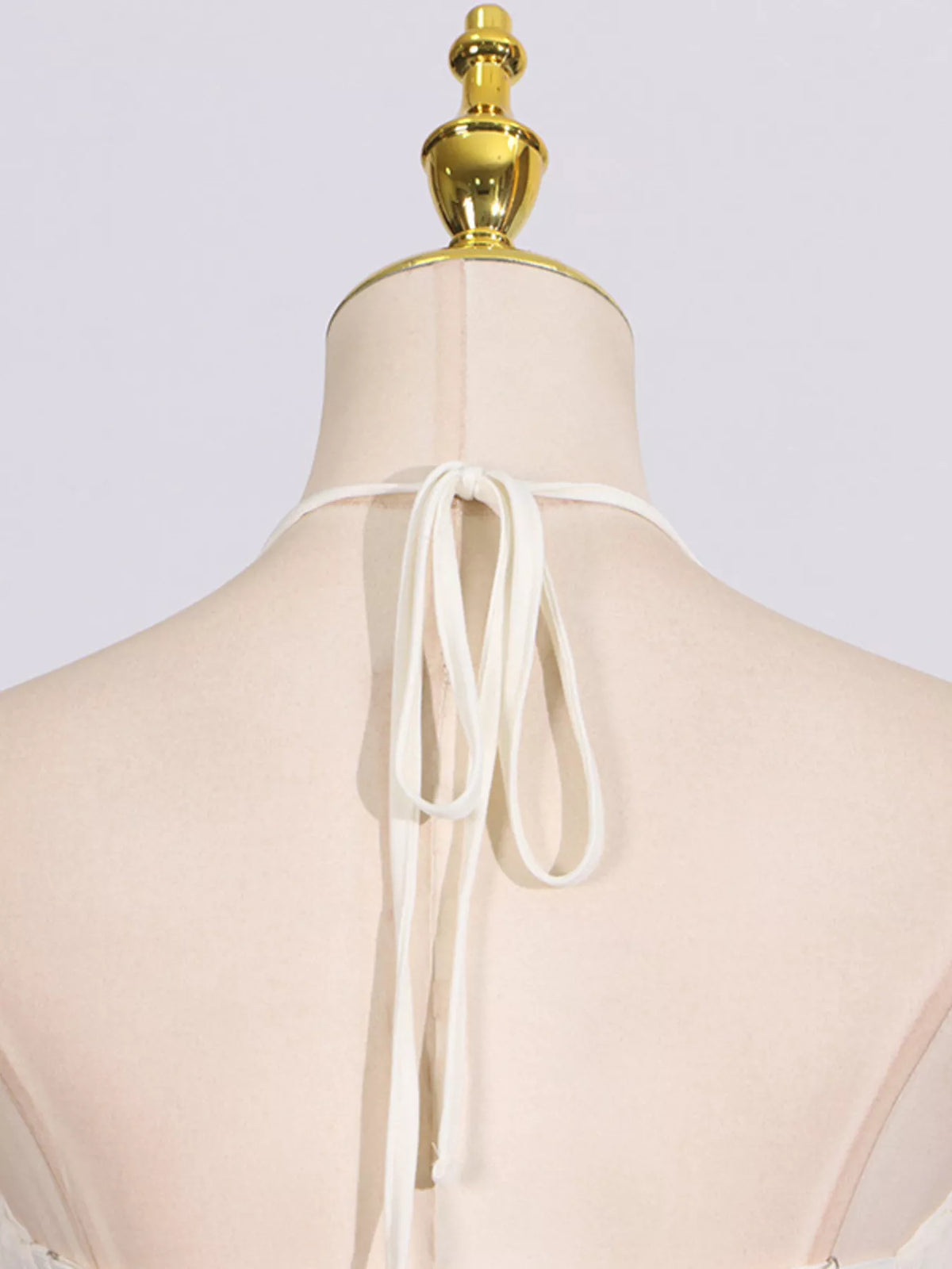 Ruched halter neck dress angled view