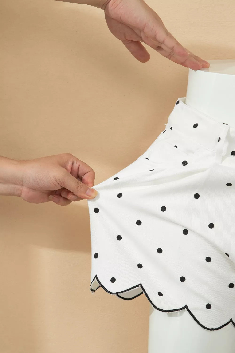 Polka dot shorts styled with a striped tee