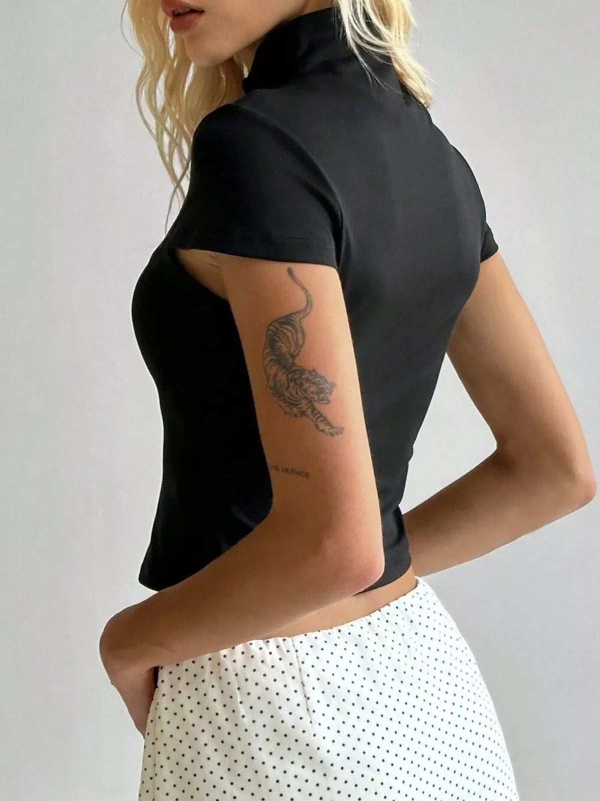 Fitted tee styled with high waisted denim