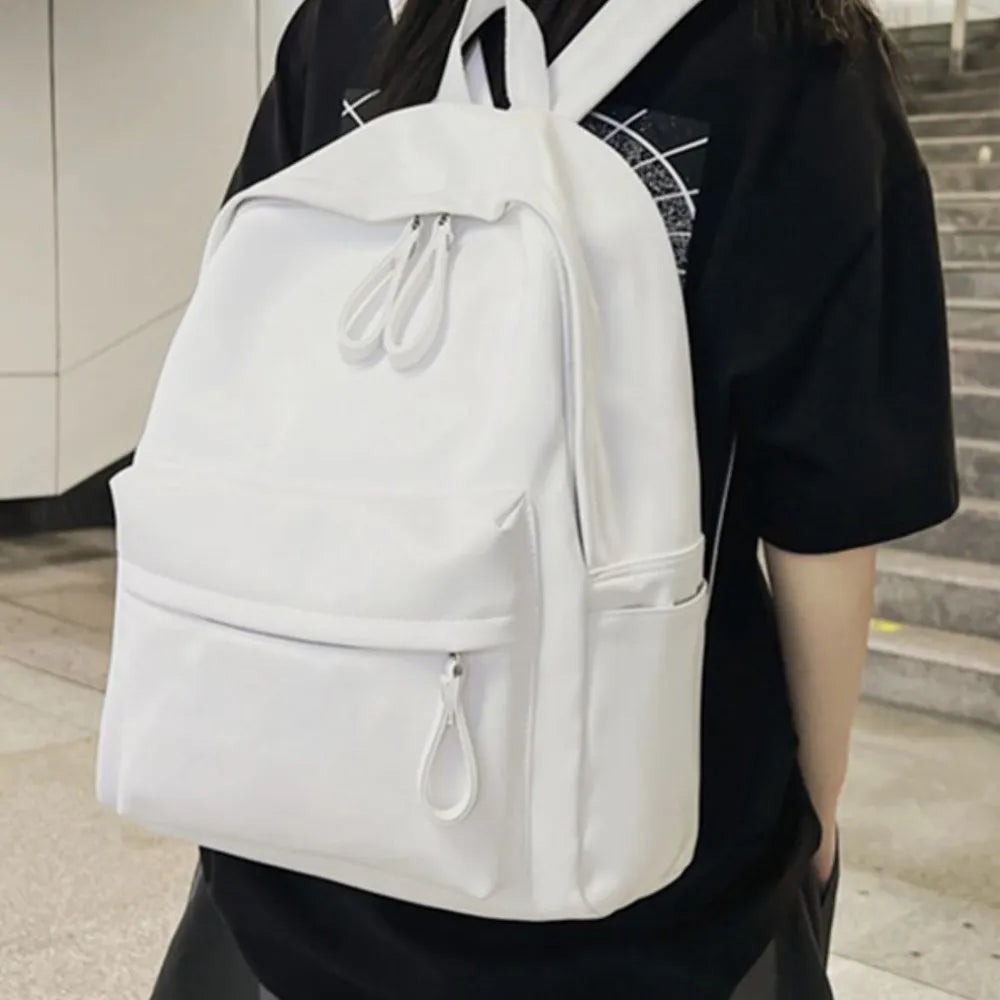 Faux leather zip backpack clasp detail
