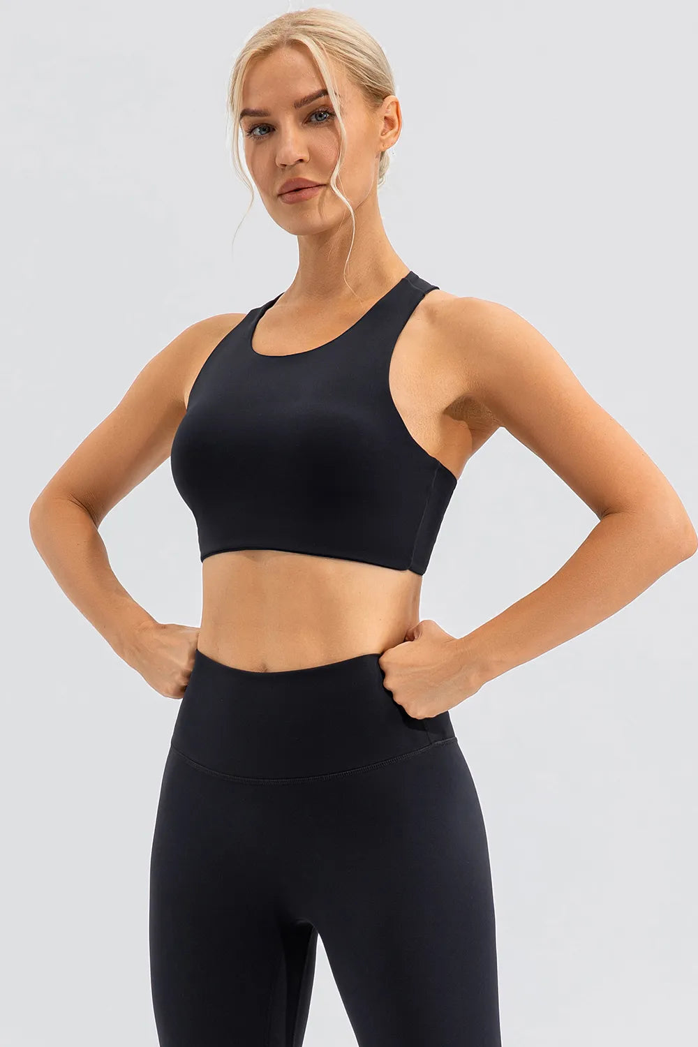 Round Neck Cutout Cropped Active Tank styled on model
