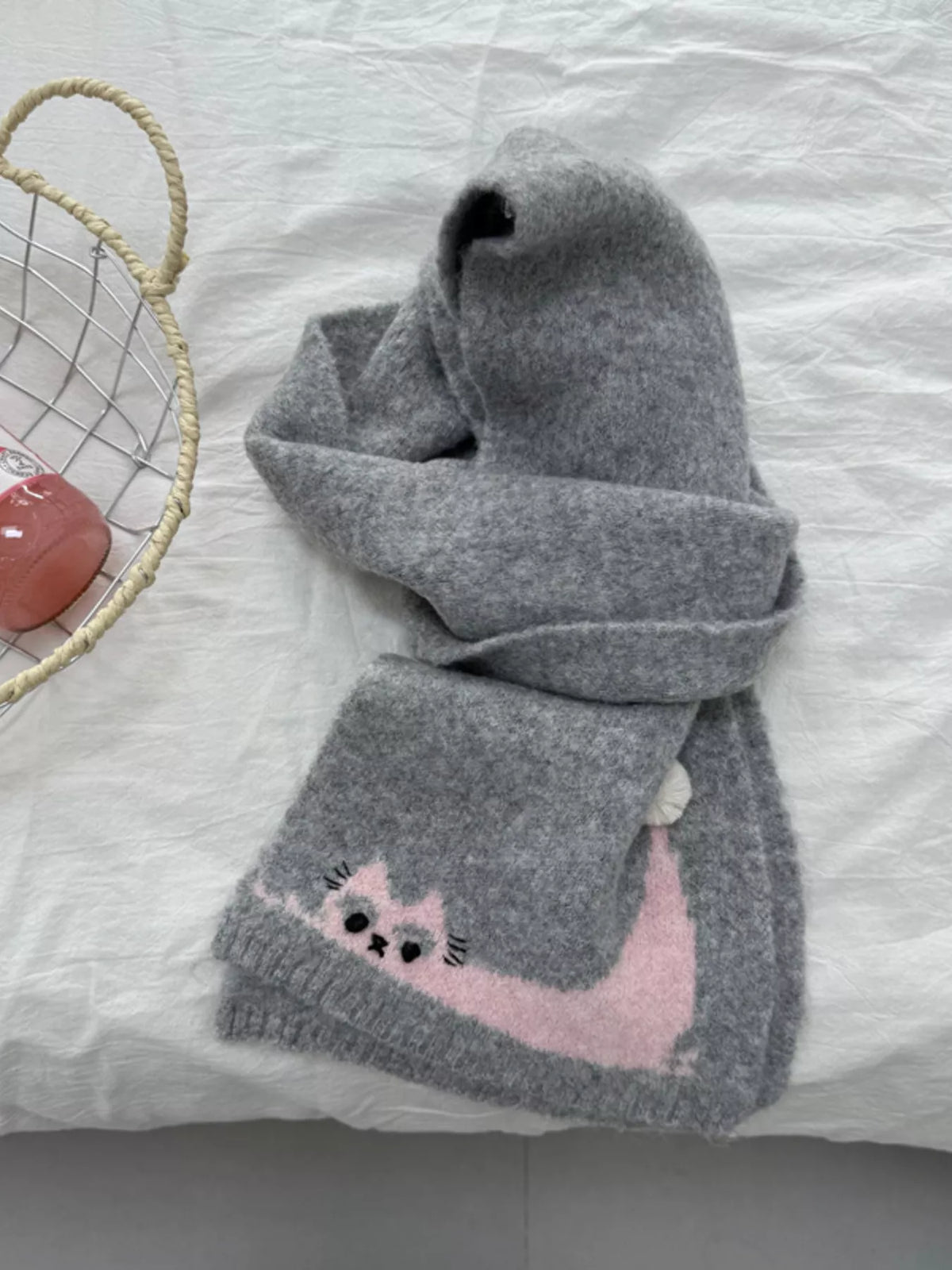 Cute cat scarf shown in a soft color option