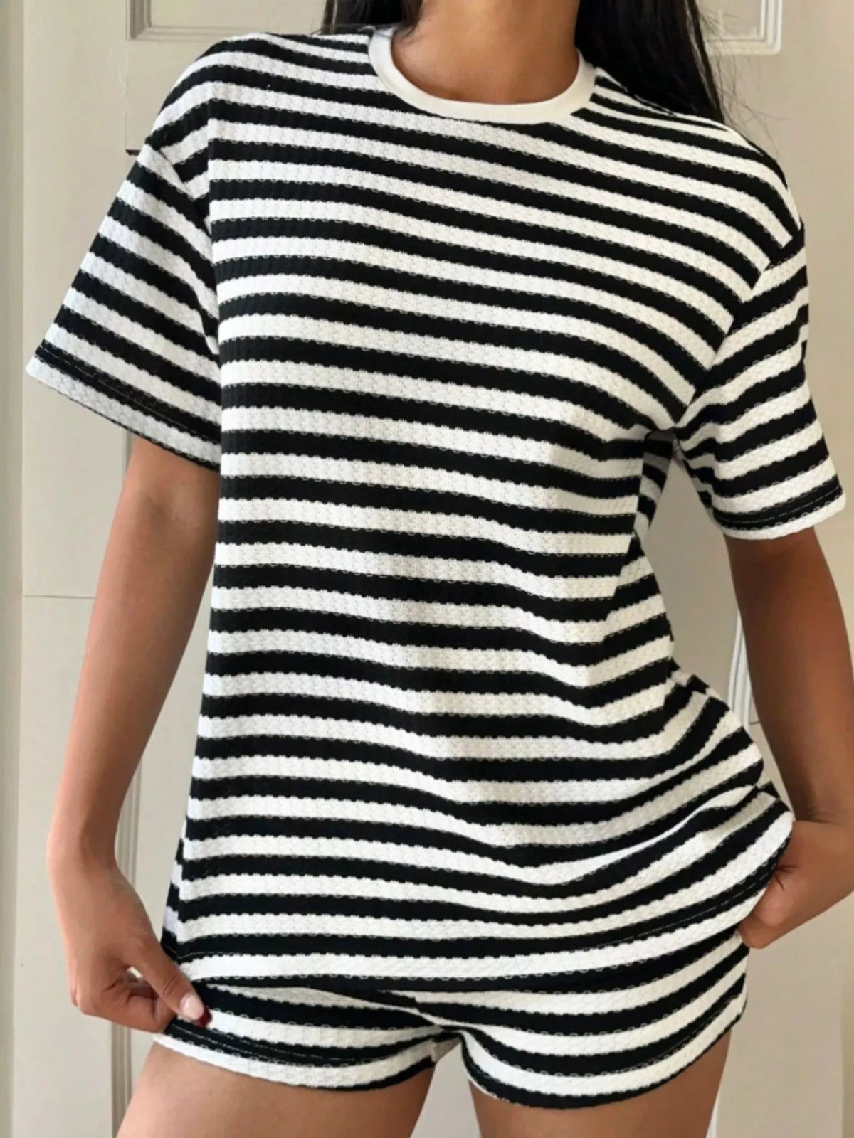 Striped round neck top detail close up