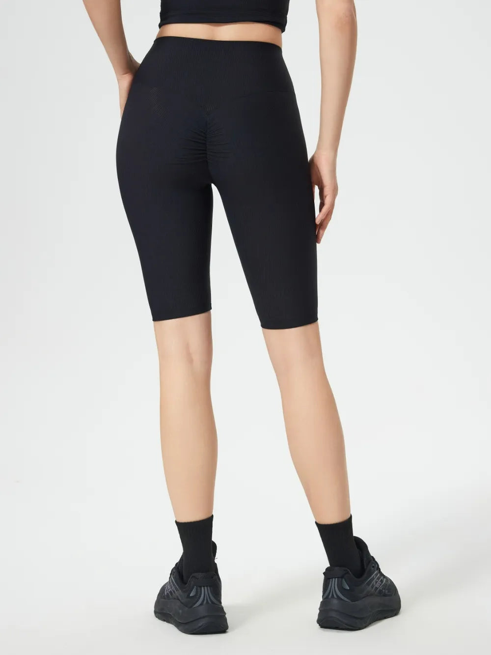 High waist stretch active shorts styled outfit view