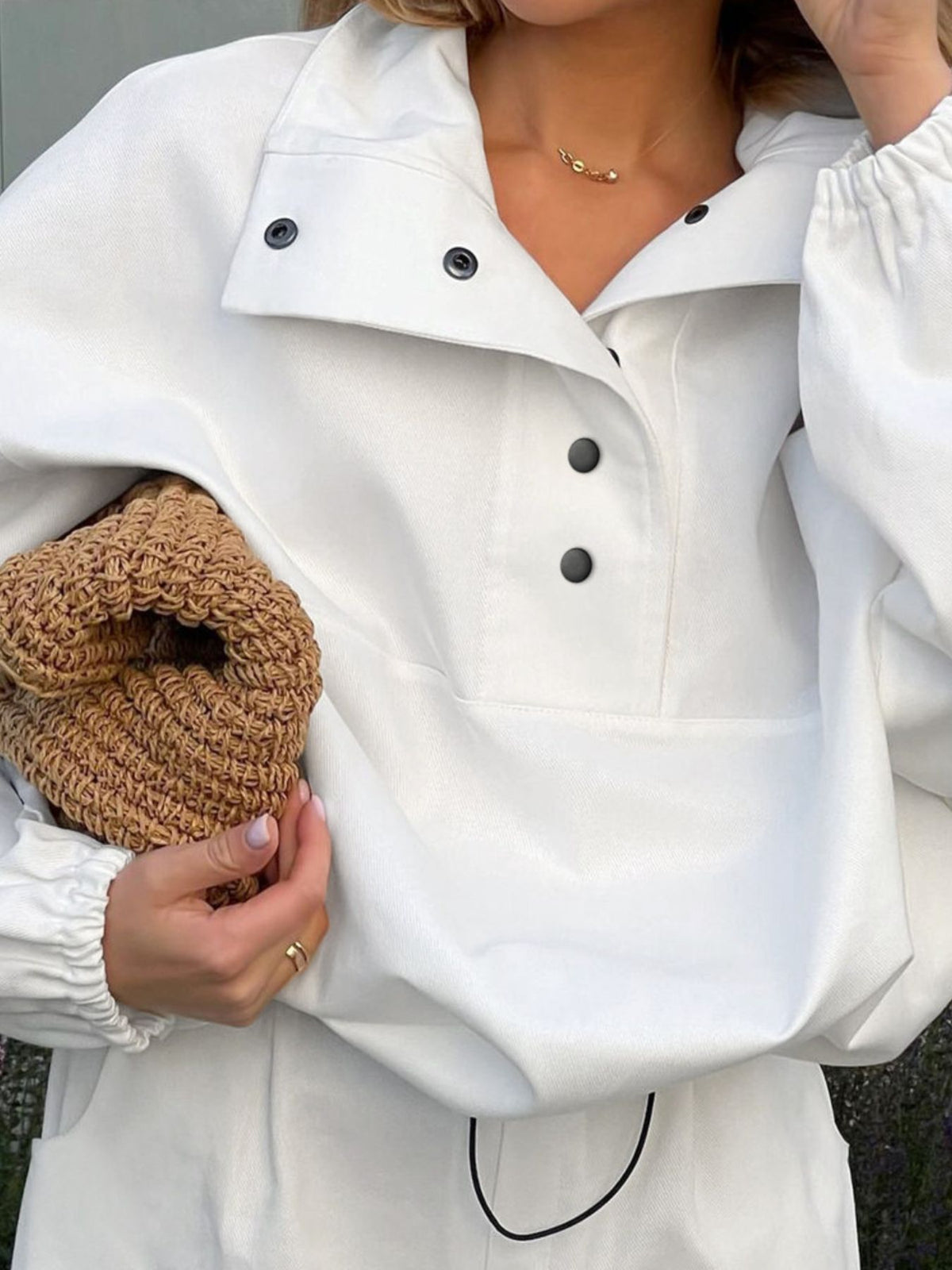 Long sleeve top snap closure detail