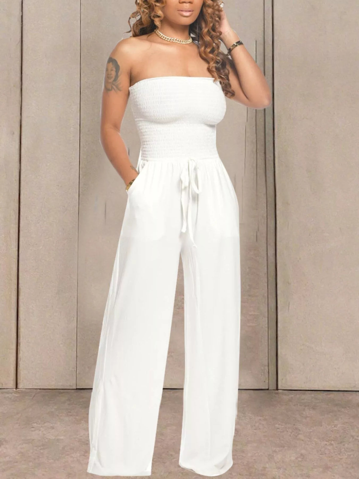 Coffee strapless smocked wide leg jumpsuit front view
