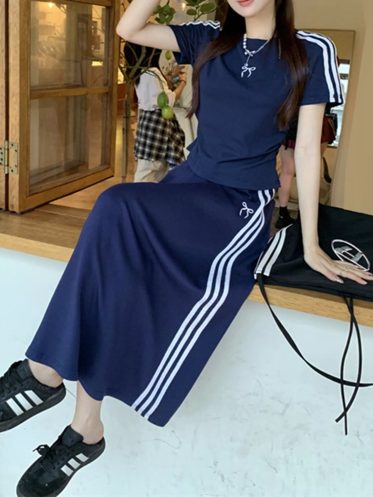 Striped tee and skirt set styled look