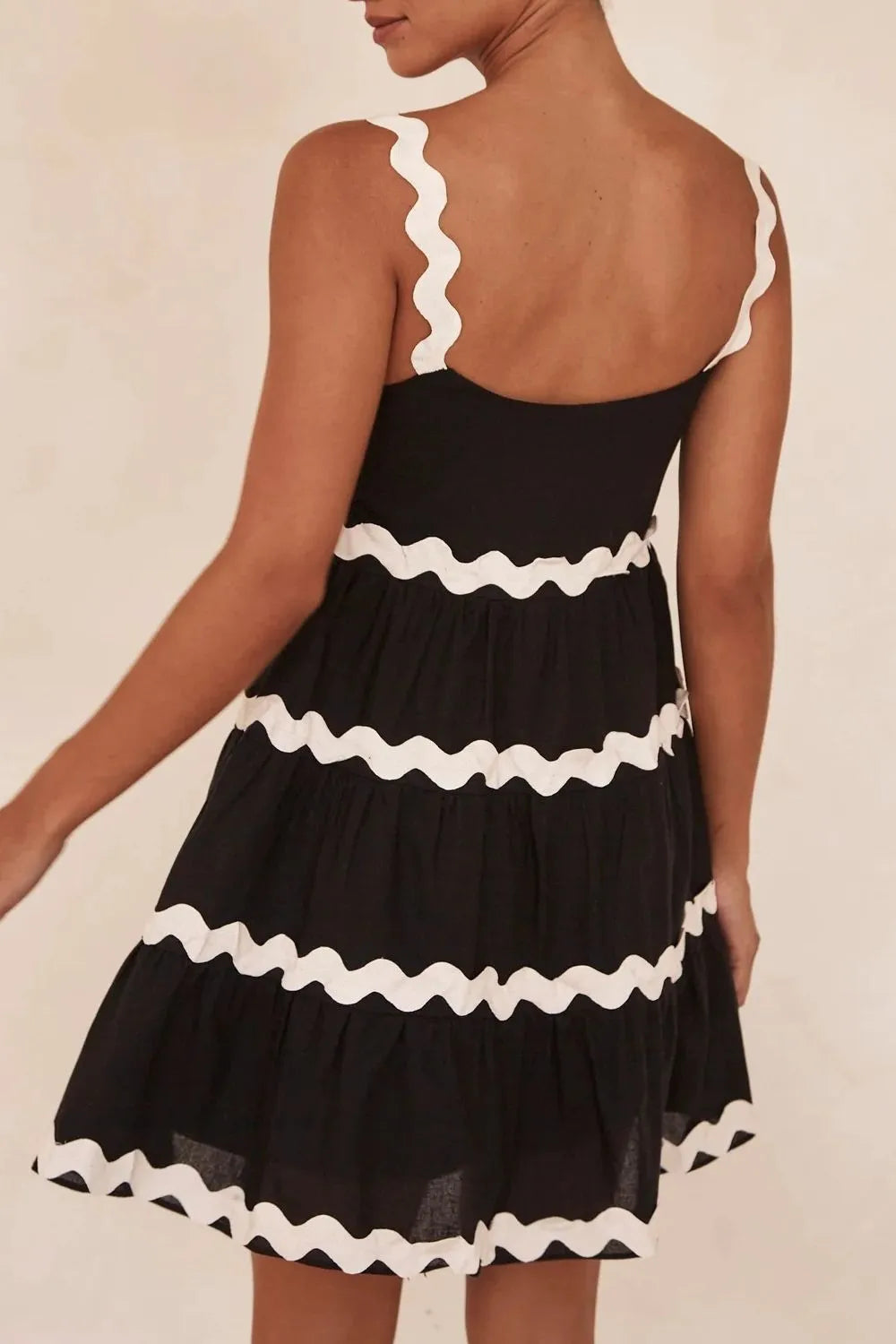 Black tiered dress contrast trim detail