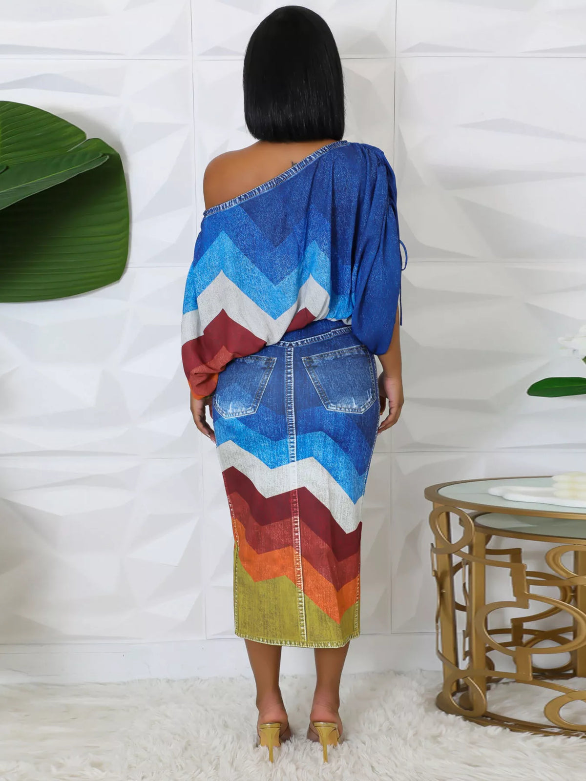 Blue coordinated one shoulder top and slit skirt set detail
