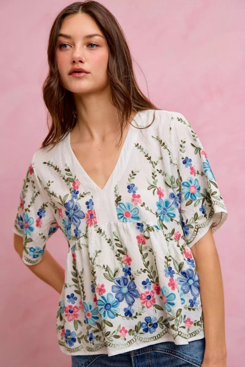 Off white floral embroidered babydoll blouse front view