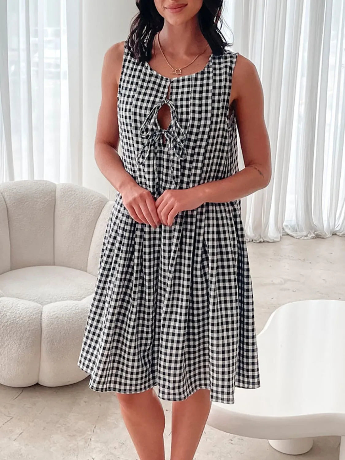 Plaid Tie Front Sleeveless Dress in Black on model