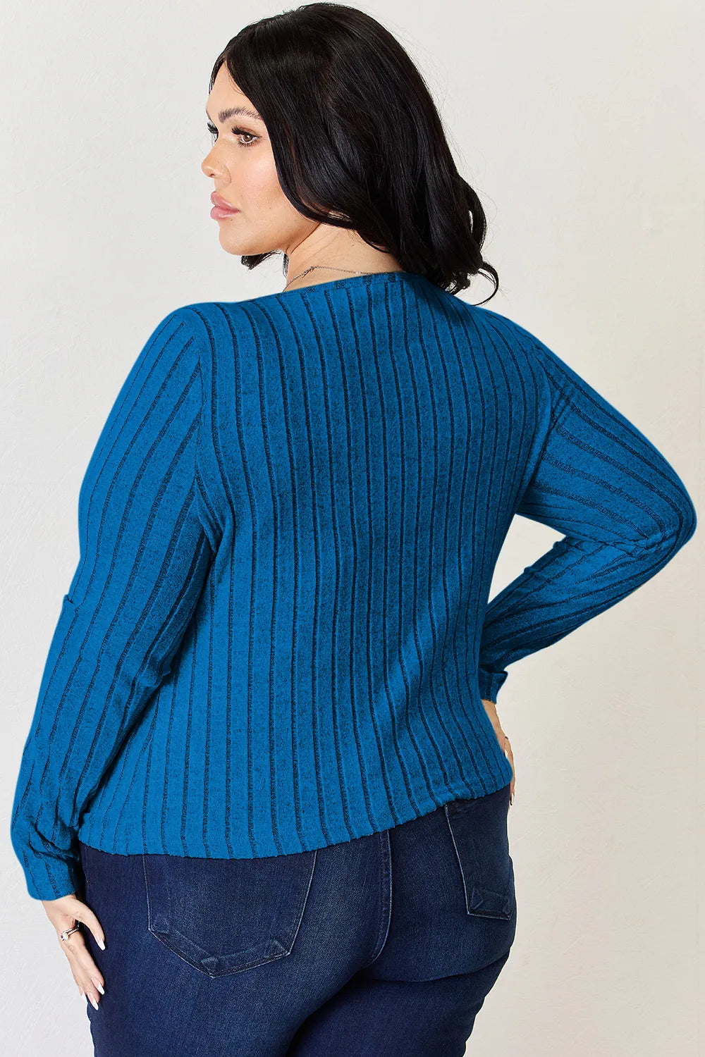 Long sleeve ribbed top standing pose