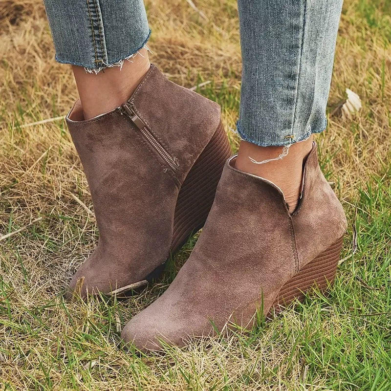 Round toe wedge ankle boots full length shot