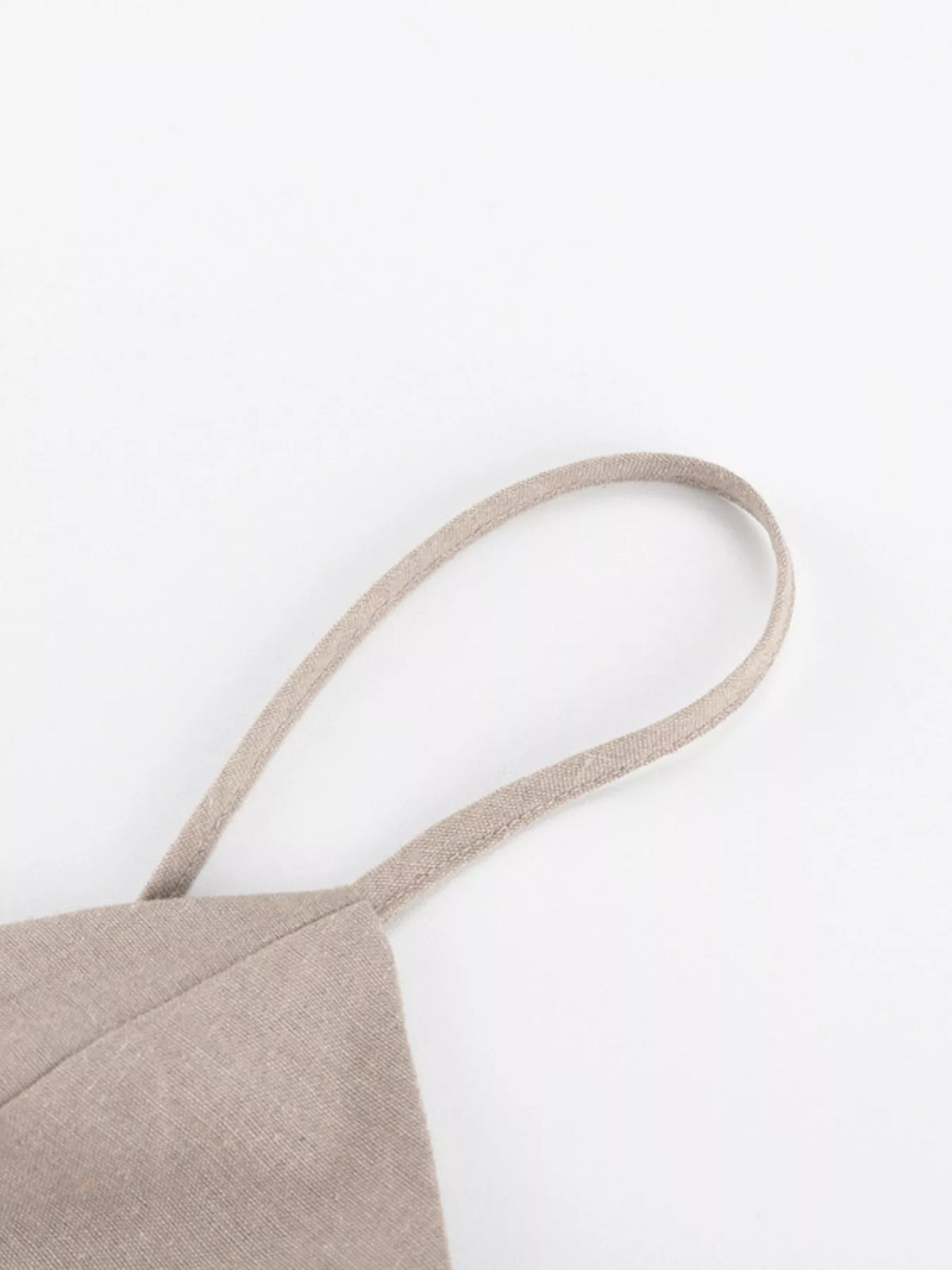 Open back and tie fastening shown from behind
