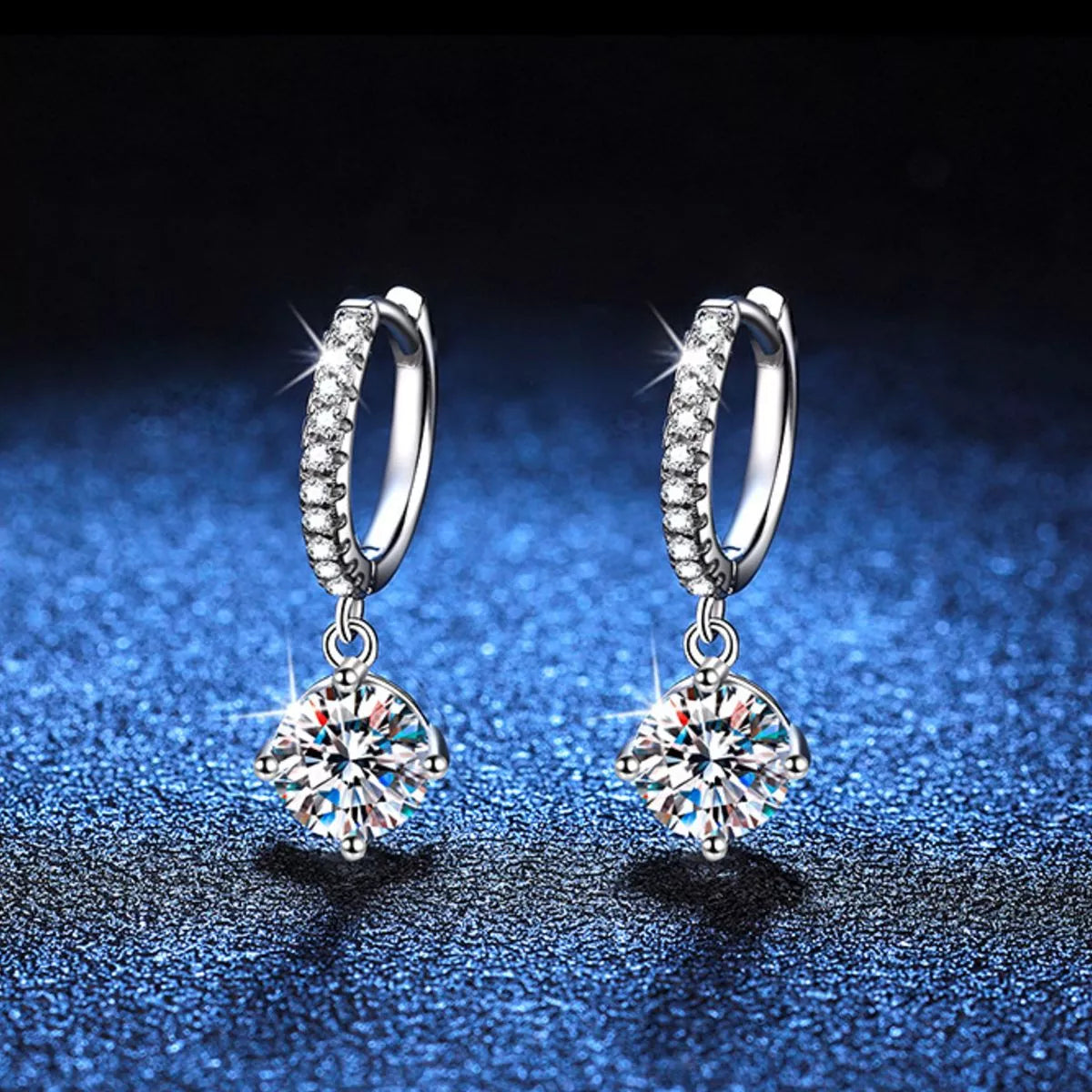 Drop earrings shown worn on the ear