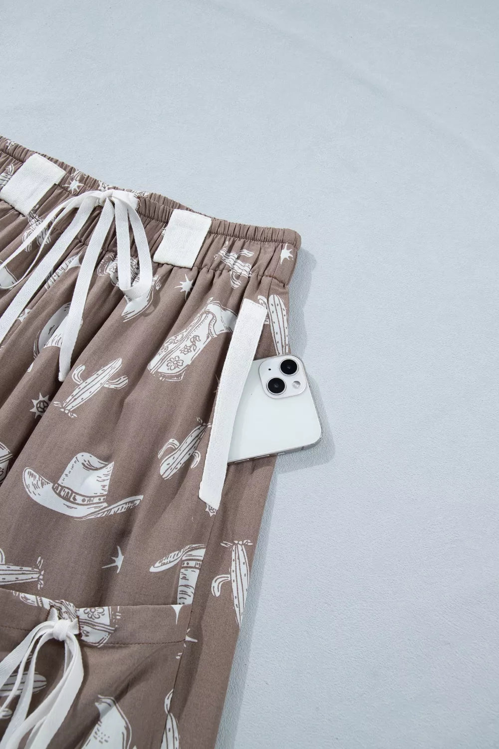 Mocha western cactus print drawstring jogger pants, detail view